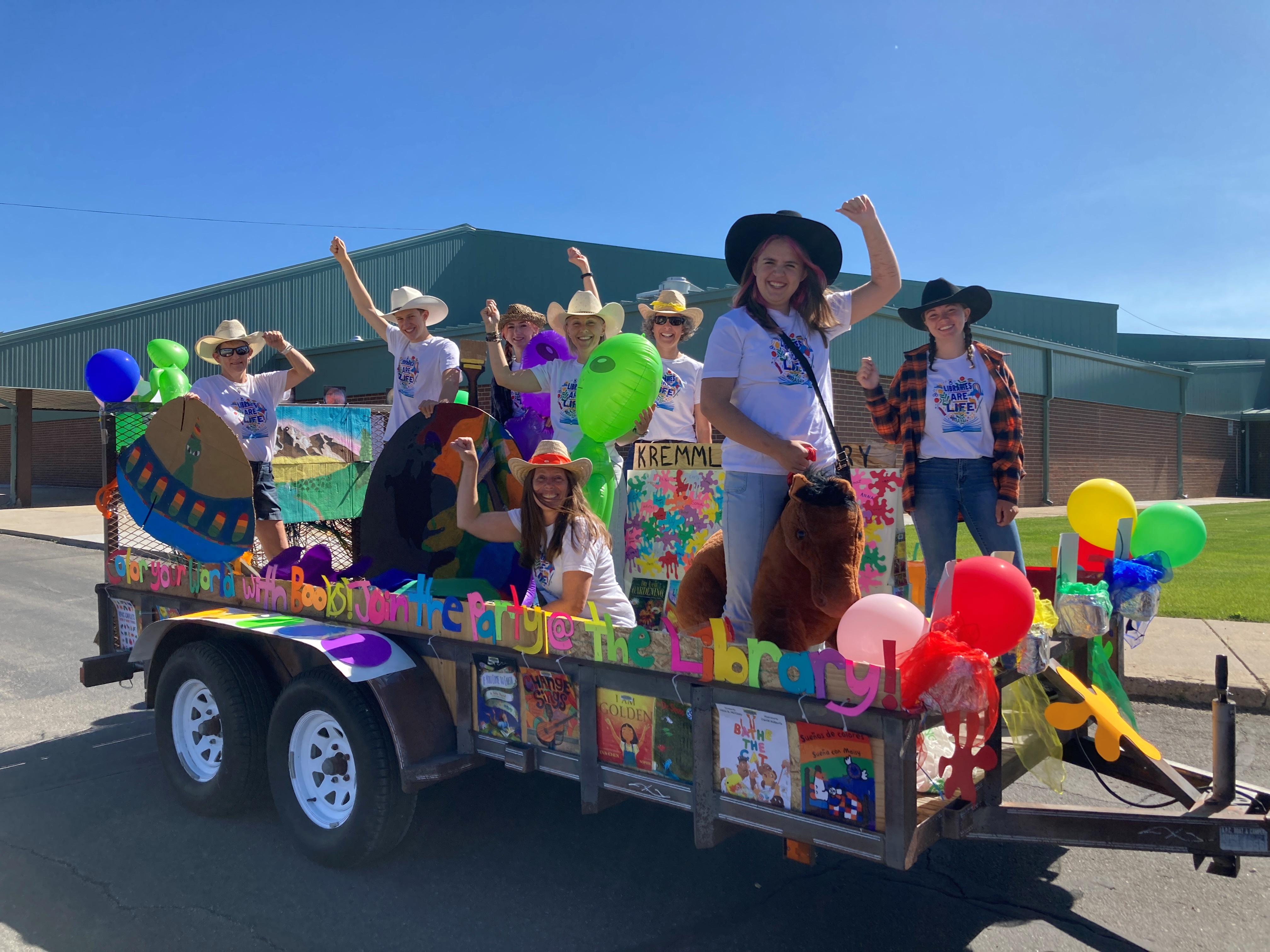 Tile painted with a picture of a black cat.
