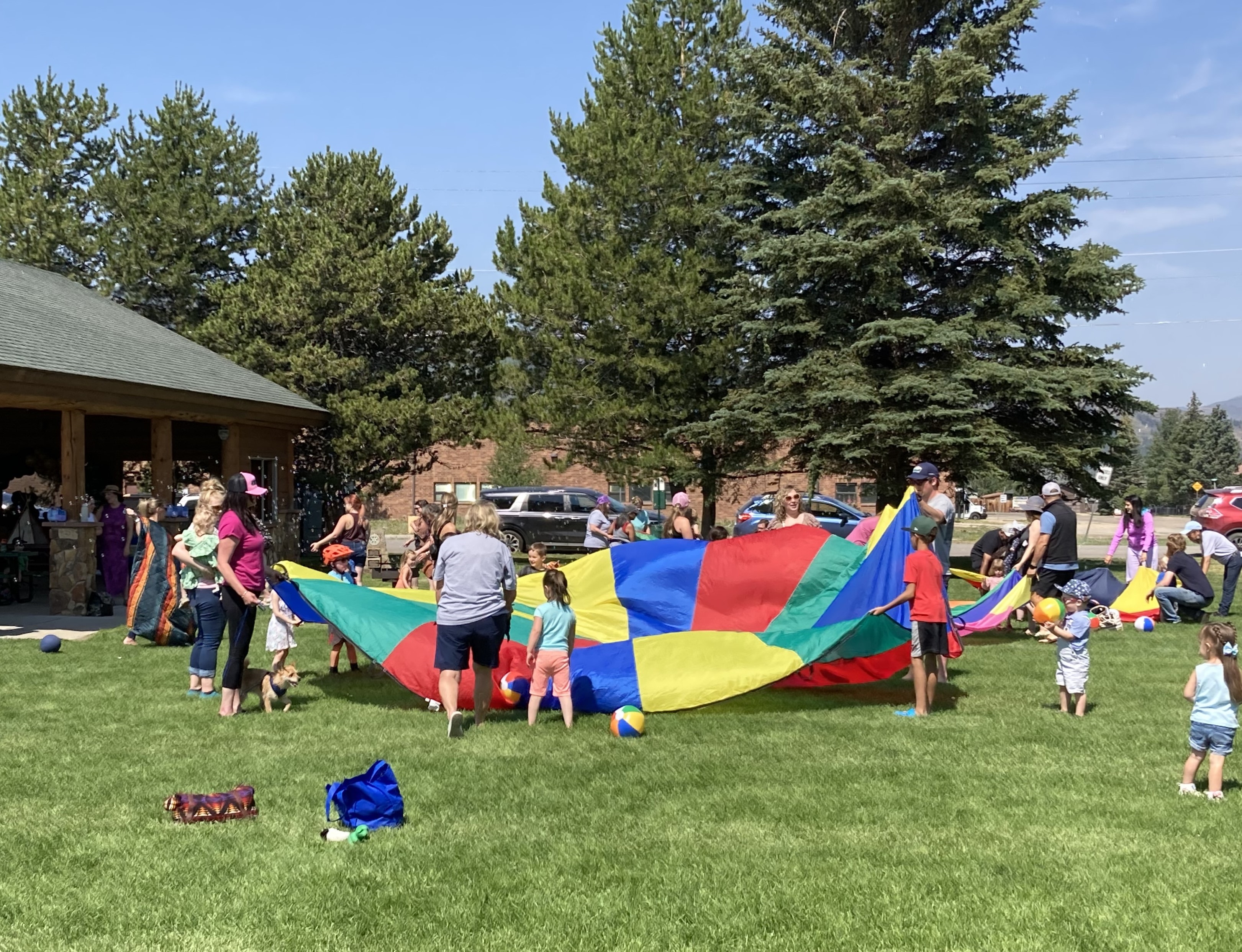 Group of paintballers on a mountaintop.
