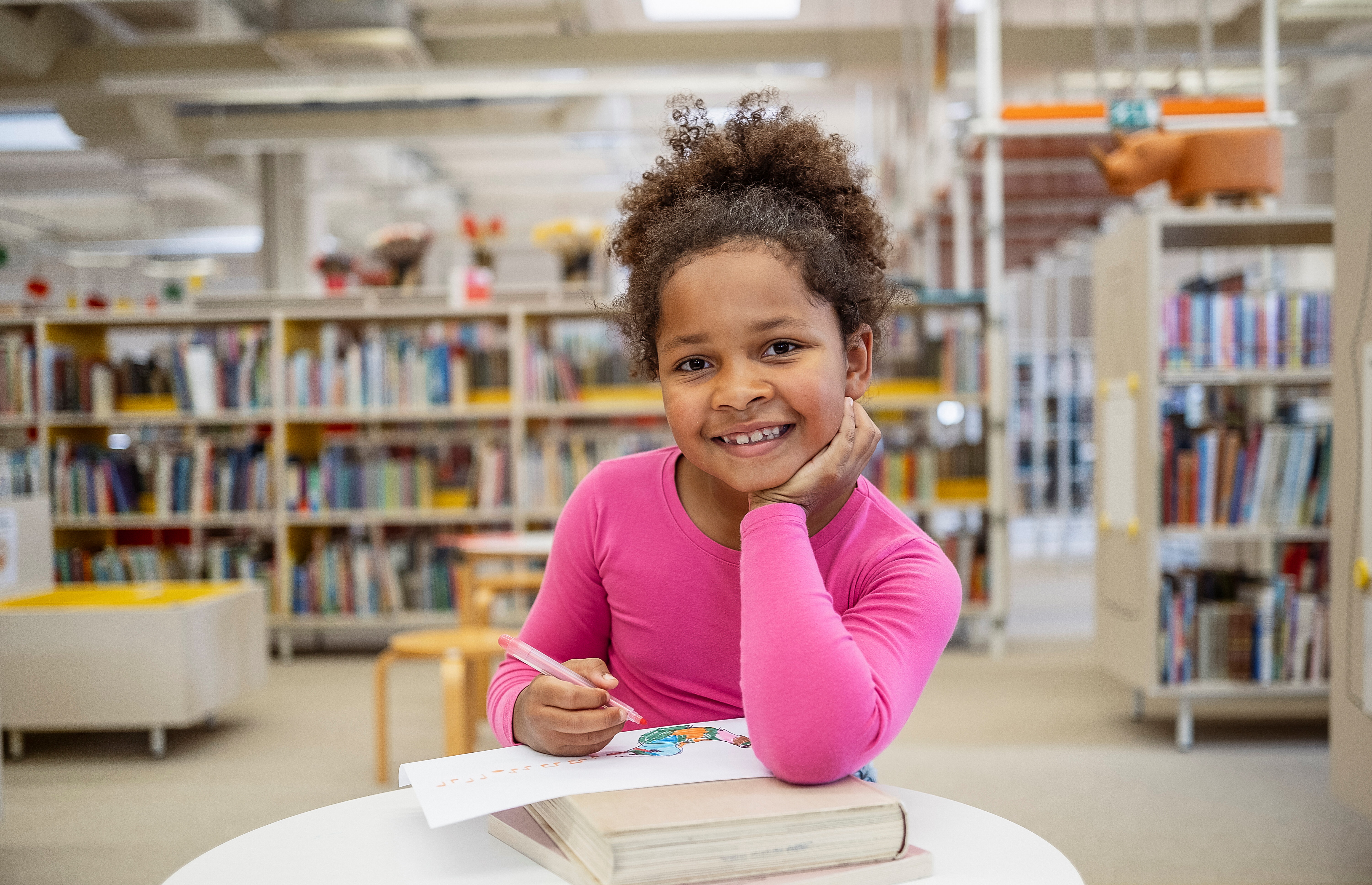 Portrait of a Young Kid in the Library