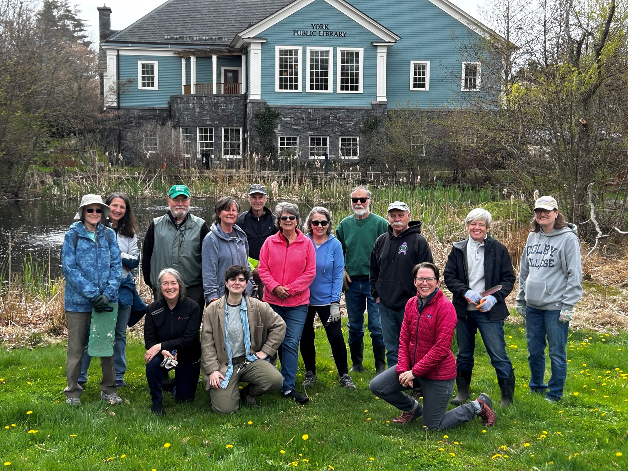 happy volunteers on library lawn