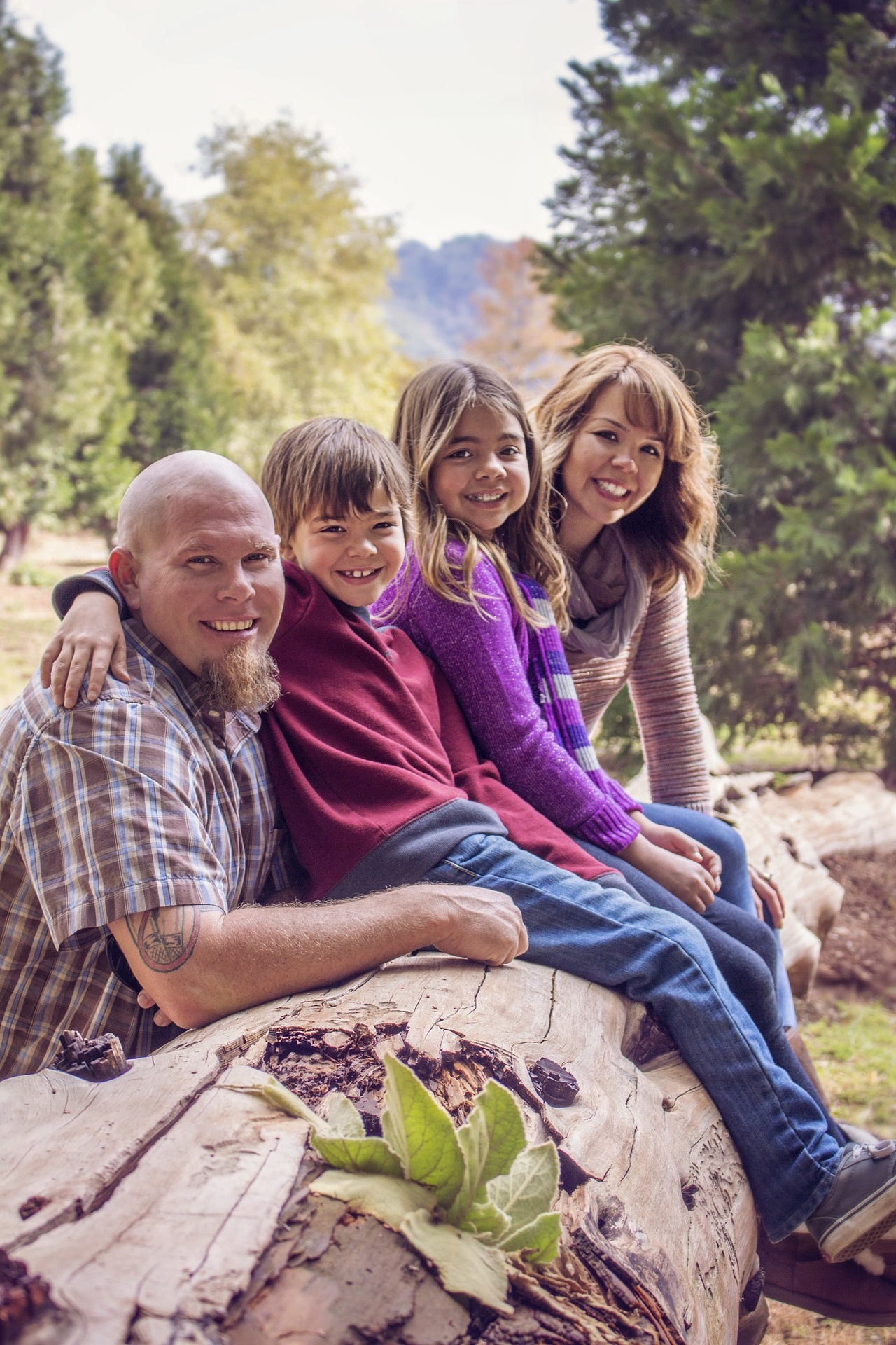 Happy Family Hiking in the Mountains