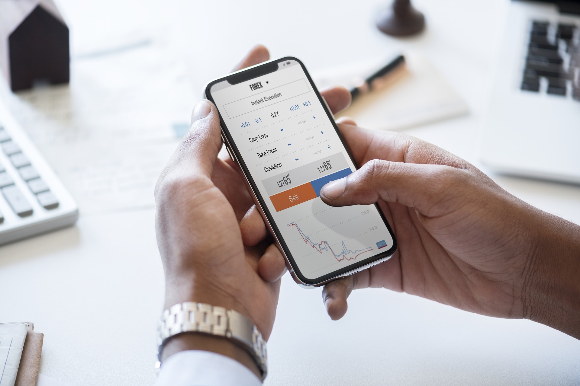 Business Man Holding Smartphone and Checking Stock Market