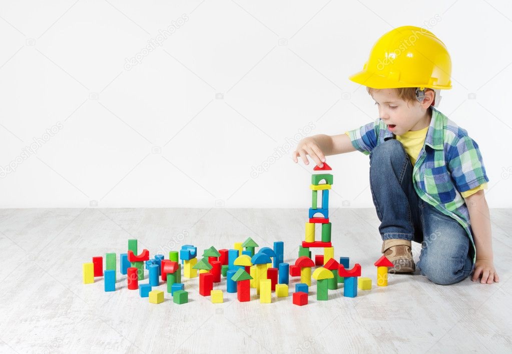 boy playing with blocks