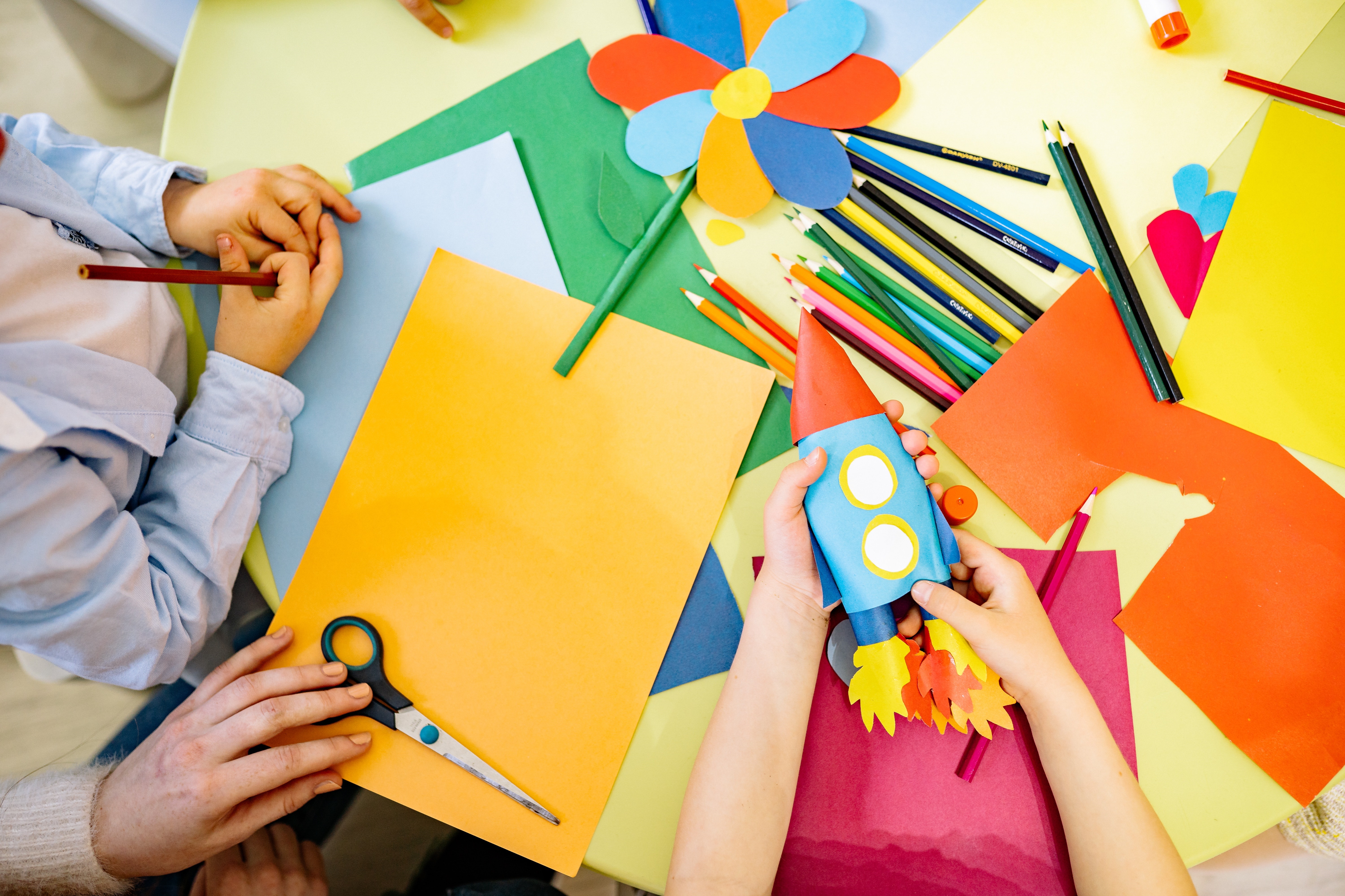 Kids and Adult Making Crafts