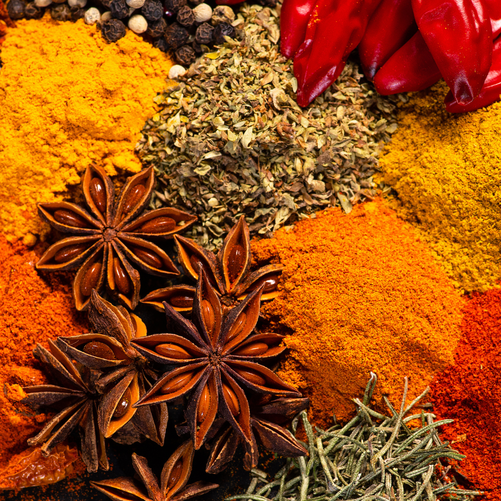 Various spices and herbs in organized piles