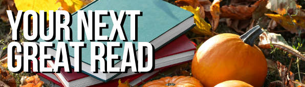 Books and pumpkins among autumn leaves with text 