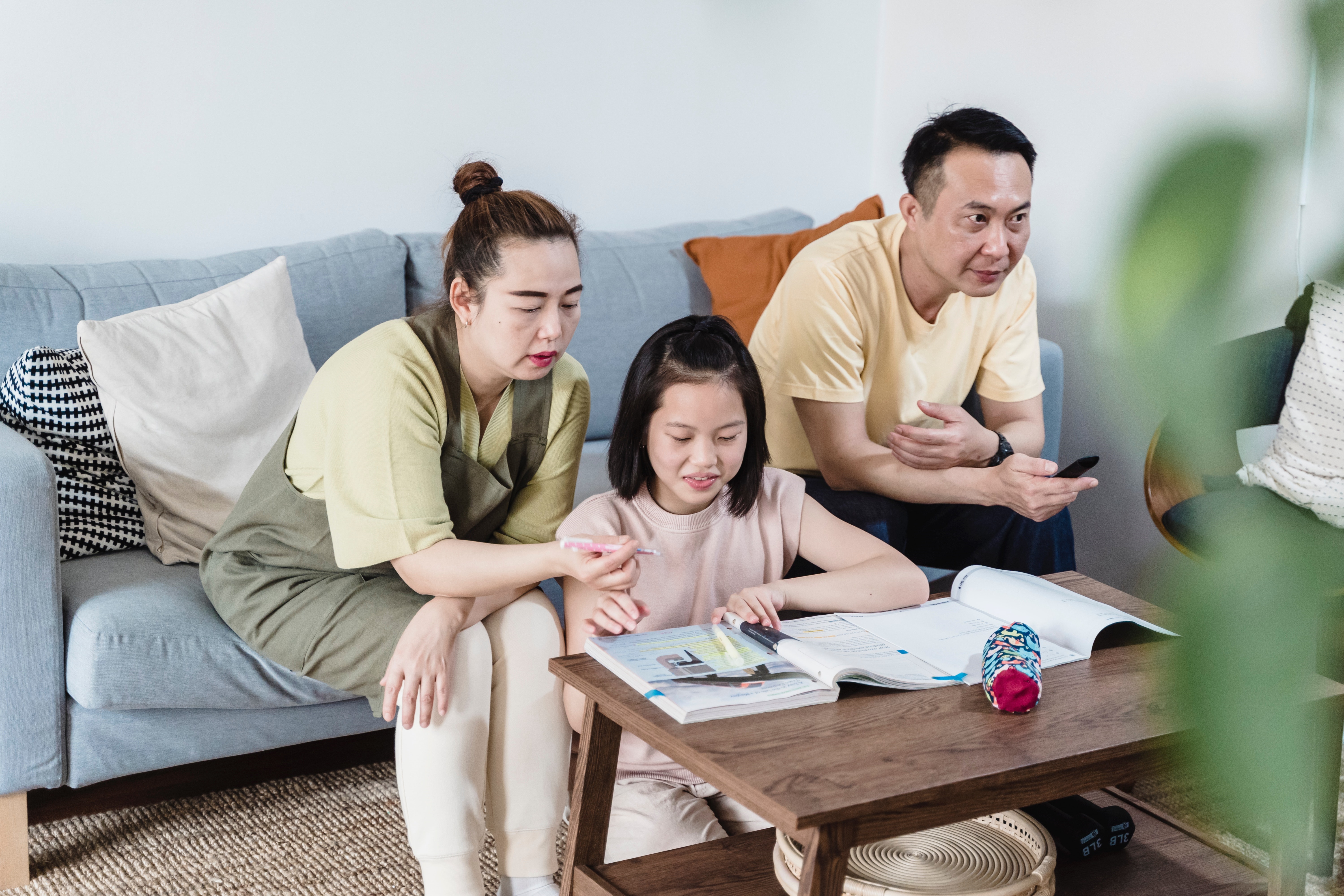 A Family Sitting in the Living Room