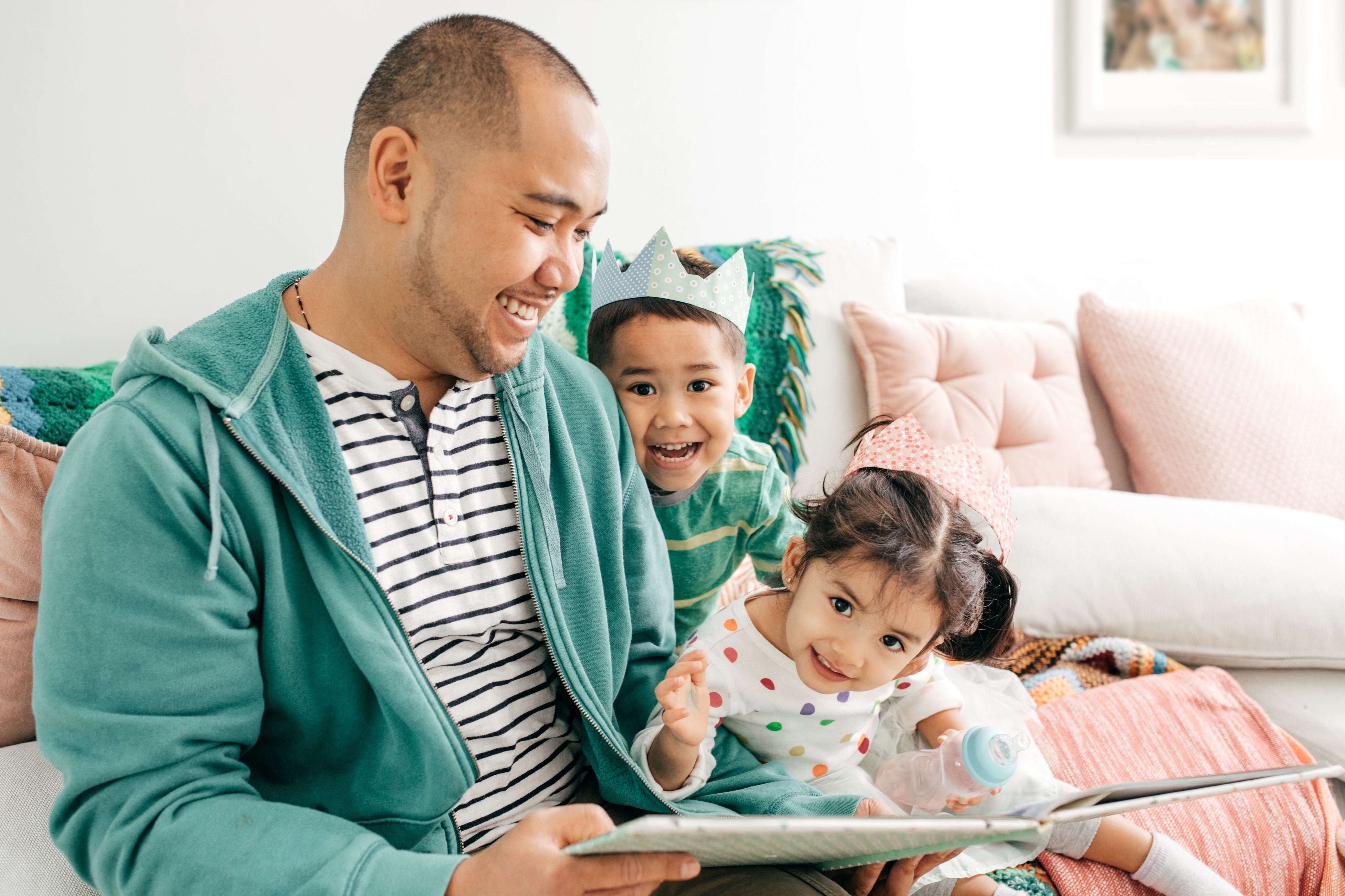 Father Reading Story Book For Kids