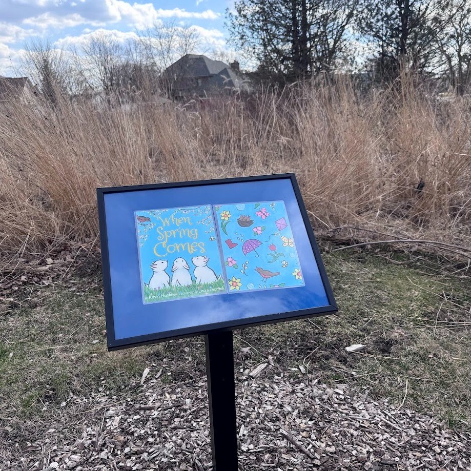 StoryWalk sign with "When Spring Comes" book inside at the Meadow Springs Conservancy. StoryWalk sign with "When Spring Comes" book inside at the Meadow Springs Conservancy.