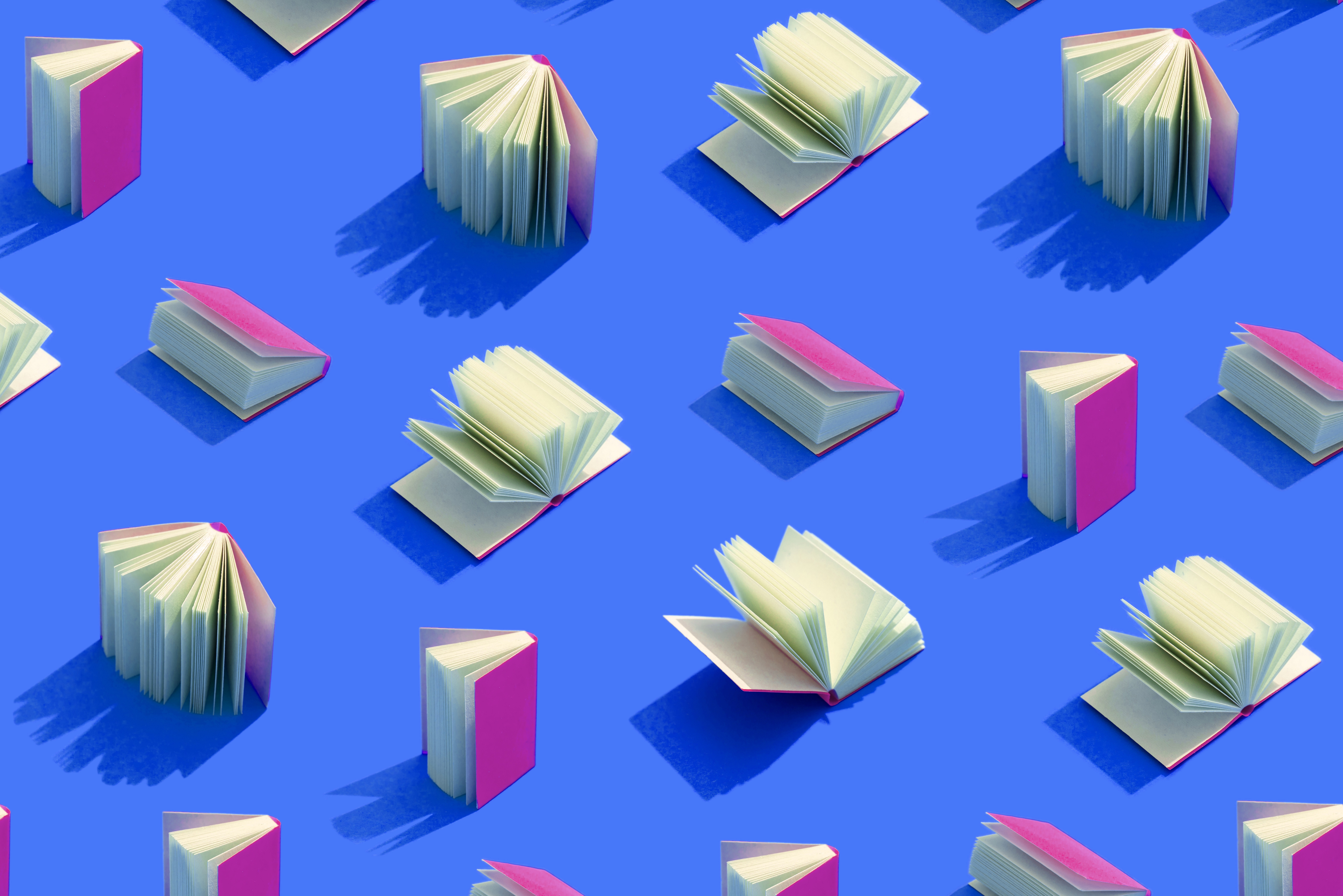 Pink Books on Blue Background