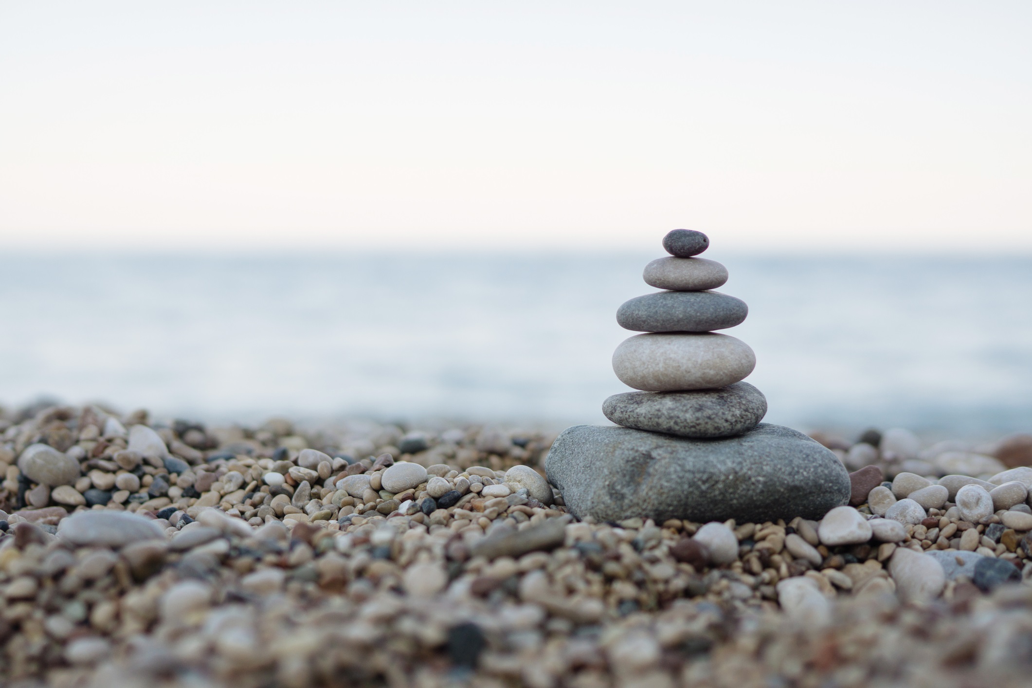 Balancing pebbles at Beach
