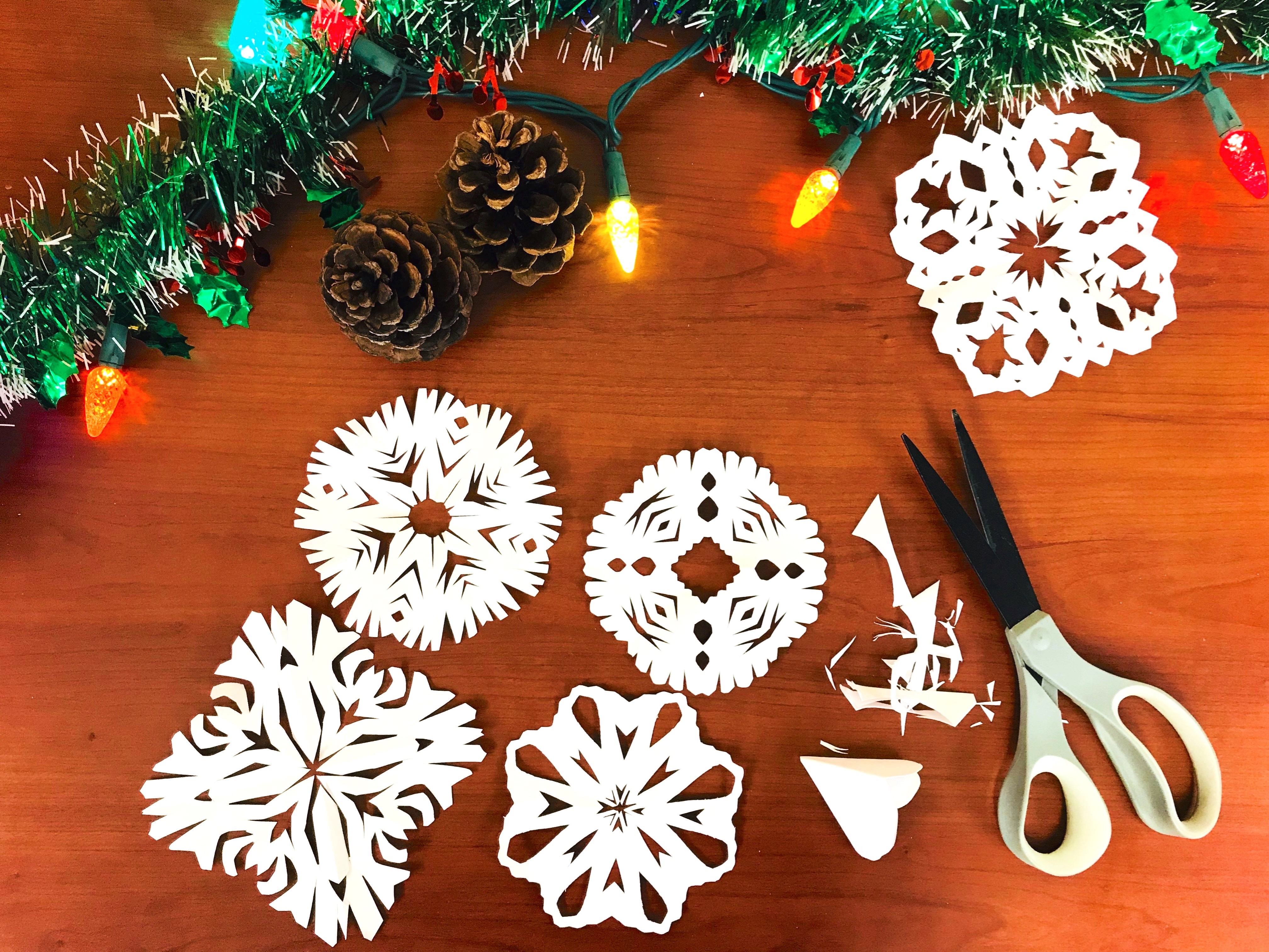 paper snowflakes and scissors