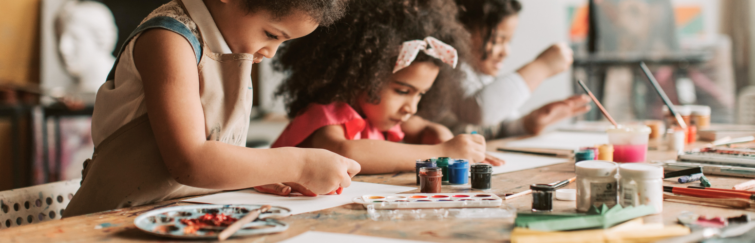 Kids painting with watercolors.