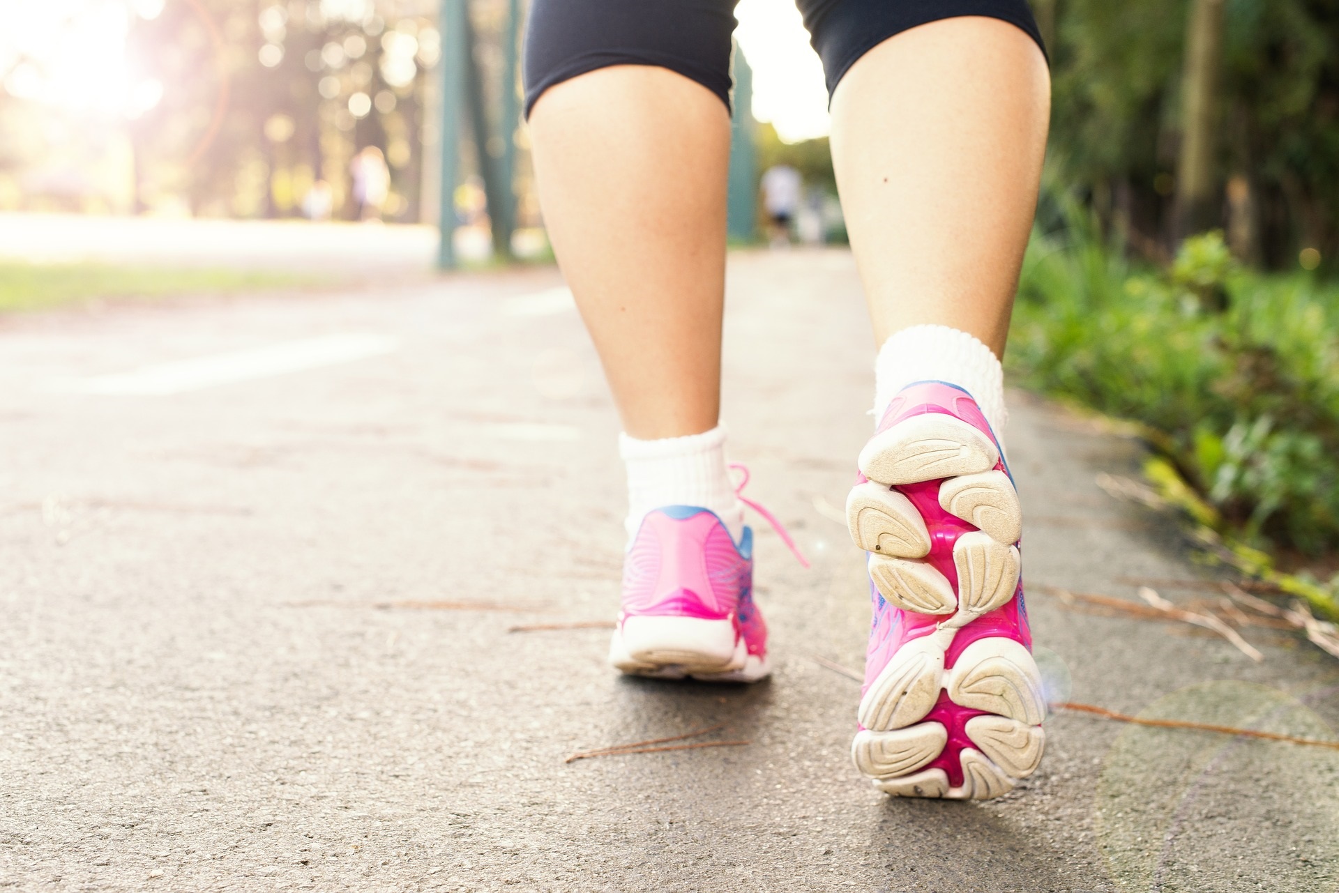 person walking with sneakers on