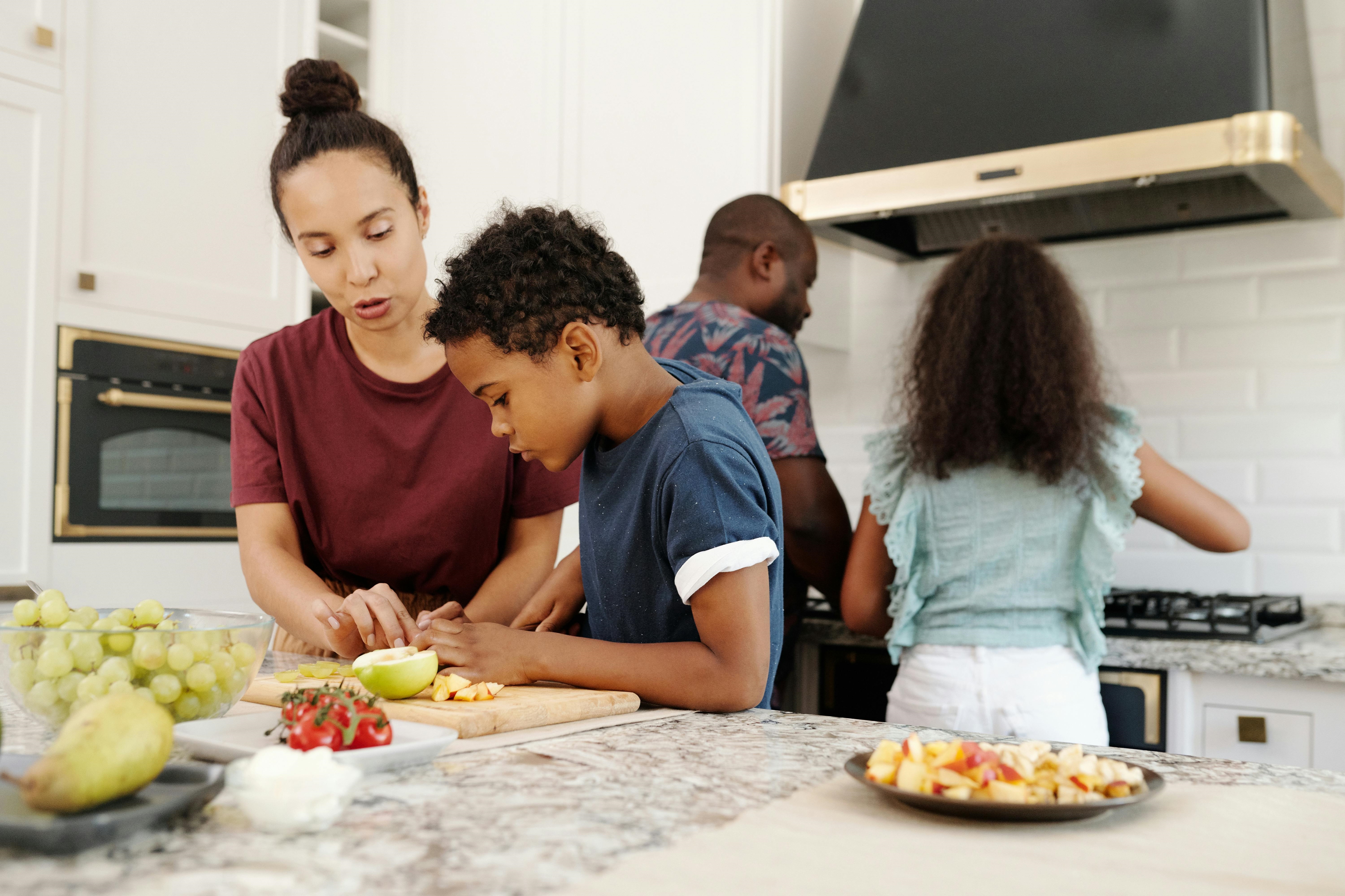 Parents Preparing Food with a Children