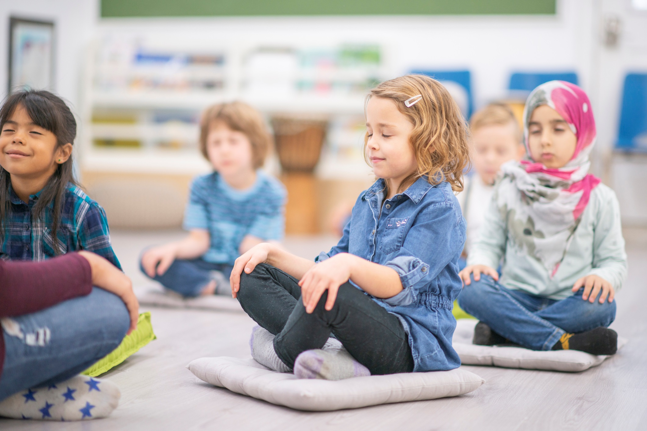 Group of Children Practicing Meditation
