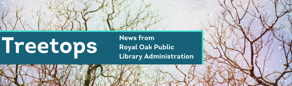 tree branches in a snowy sky