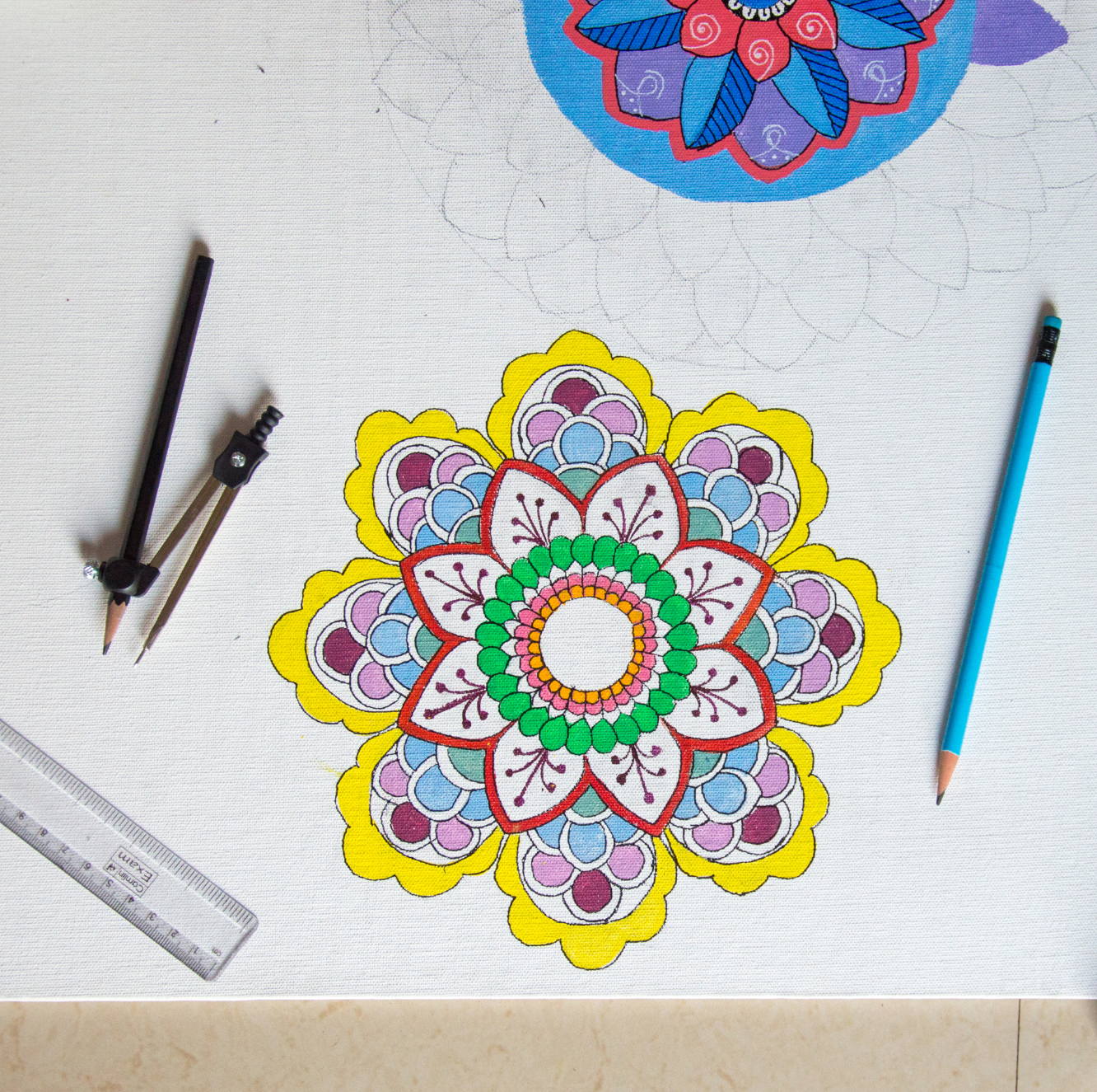 Colored Pencils on top of a coloring sheet