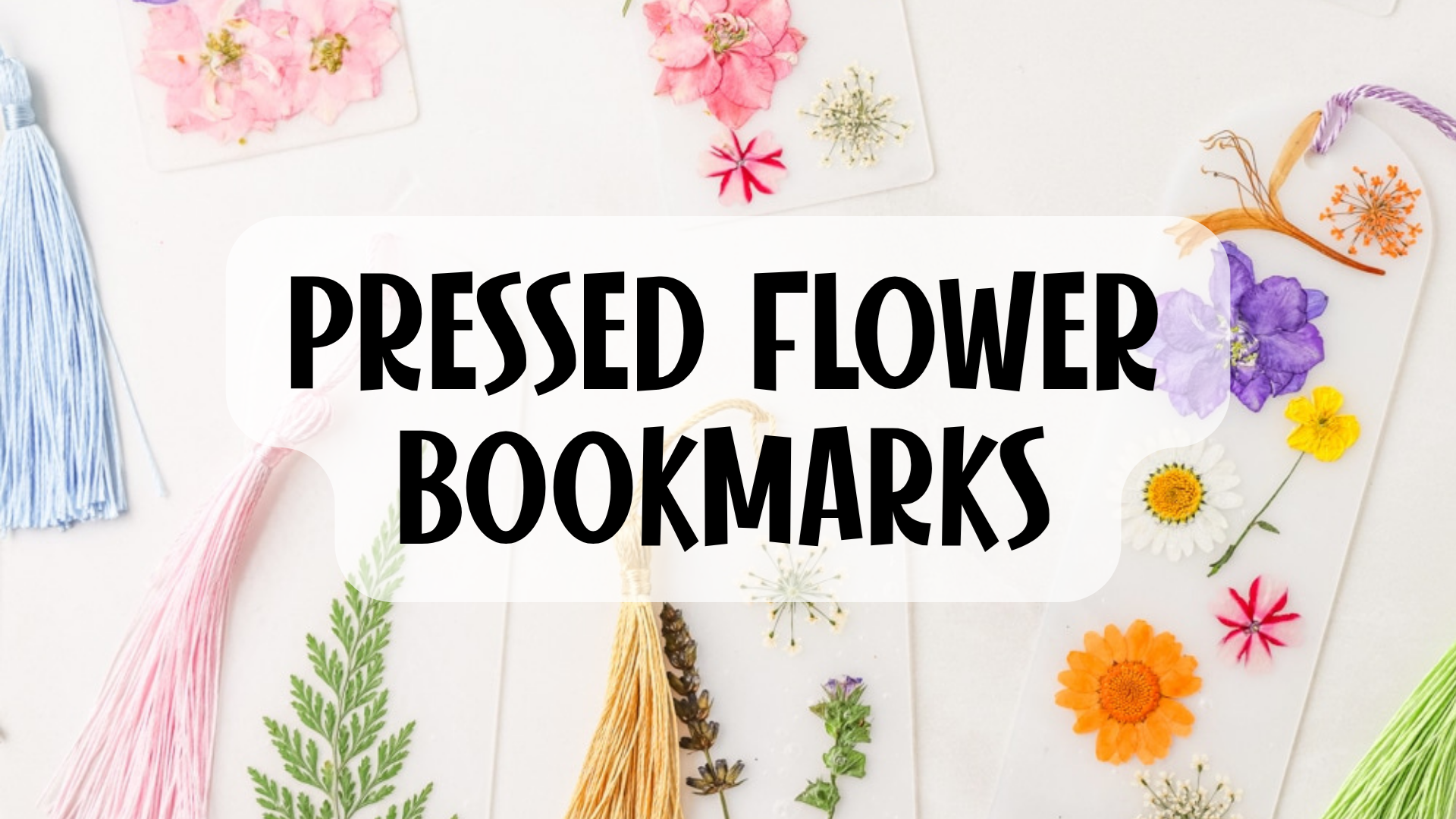 Black text “Pressed Flower Bookmarks” over white background with colorful pressed flowers, tassels, and handmade bookmark examples. Black text “Pressed Flower Bookmarks” over white background with colorful pressed flowers, tassels, and handmade bookmark examples.