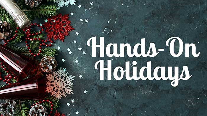 Holiday decor with pinecones, snowflakes, and champagne flutes next to text reading ‘Hands-On Holidays.'