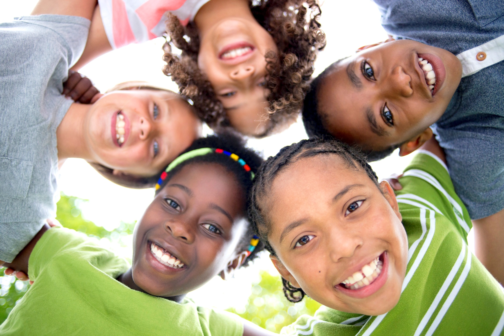 Group of Smiling Kids Facing Down