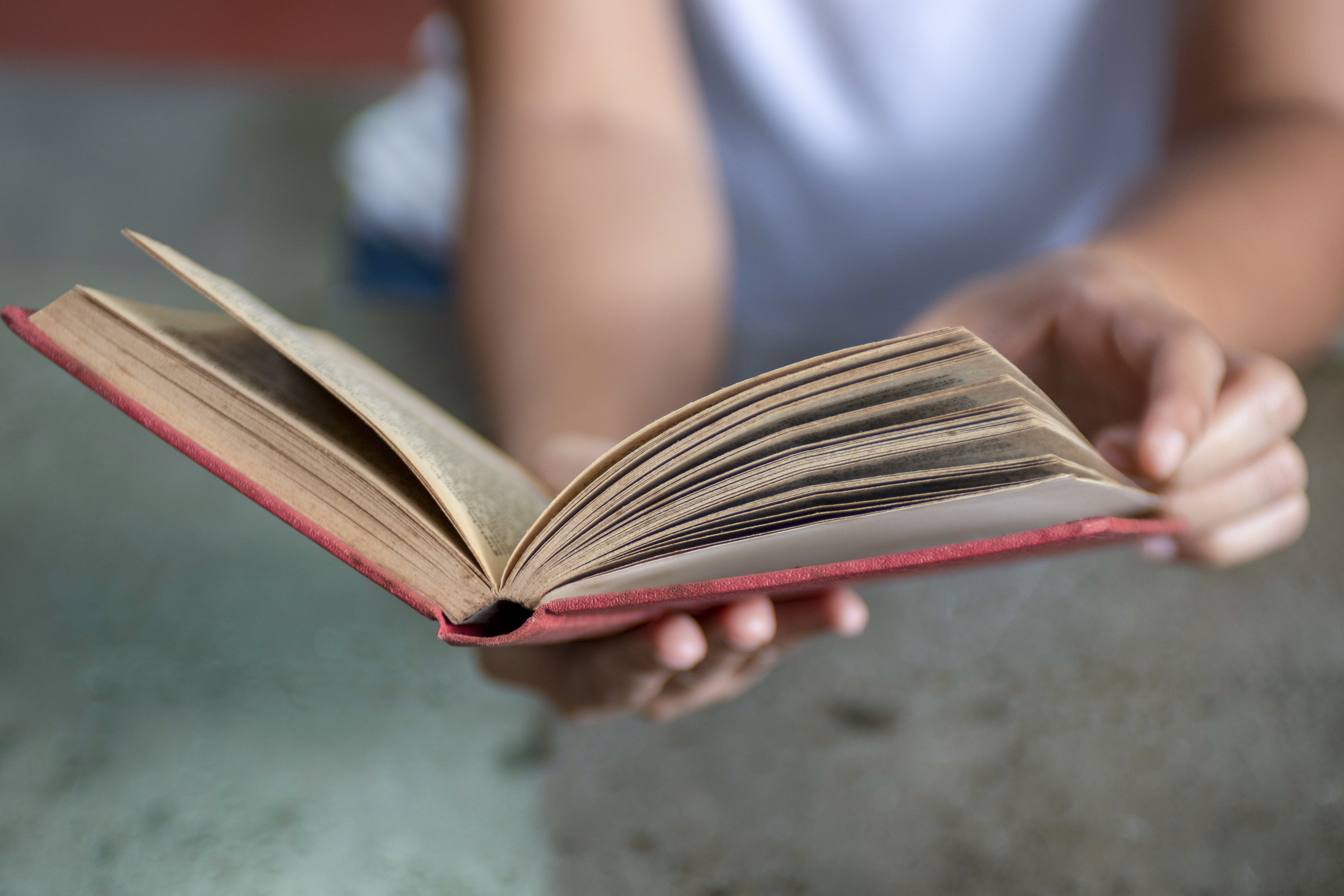 Close Up of Person Reading a Book