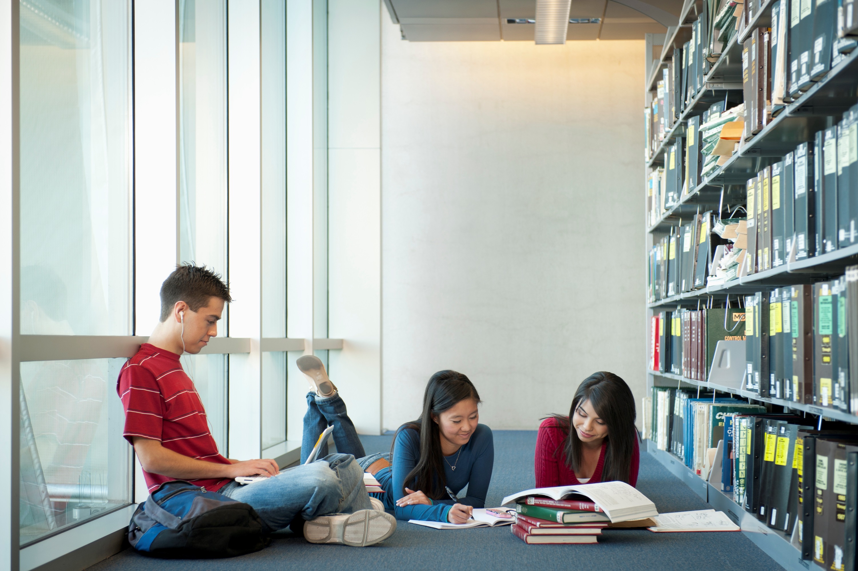 Students Studying on Library Floor