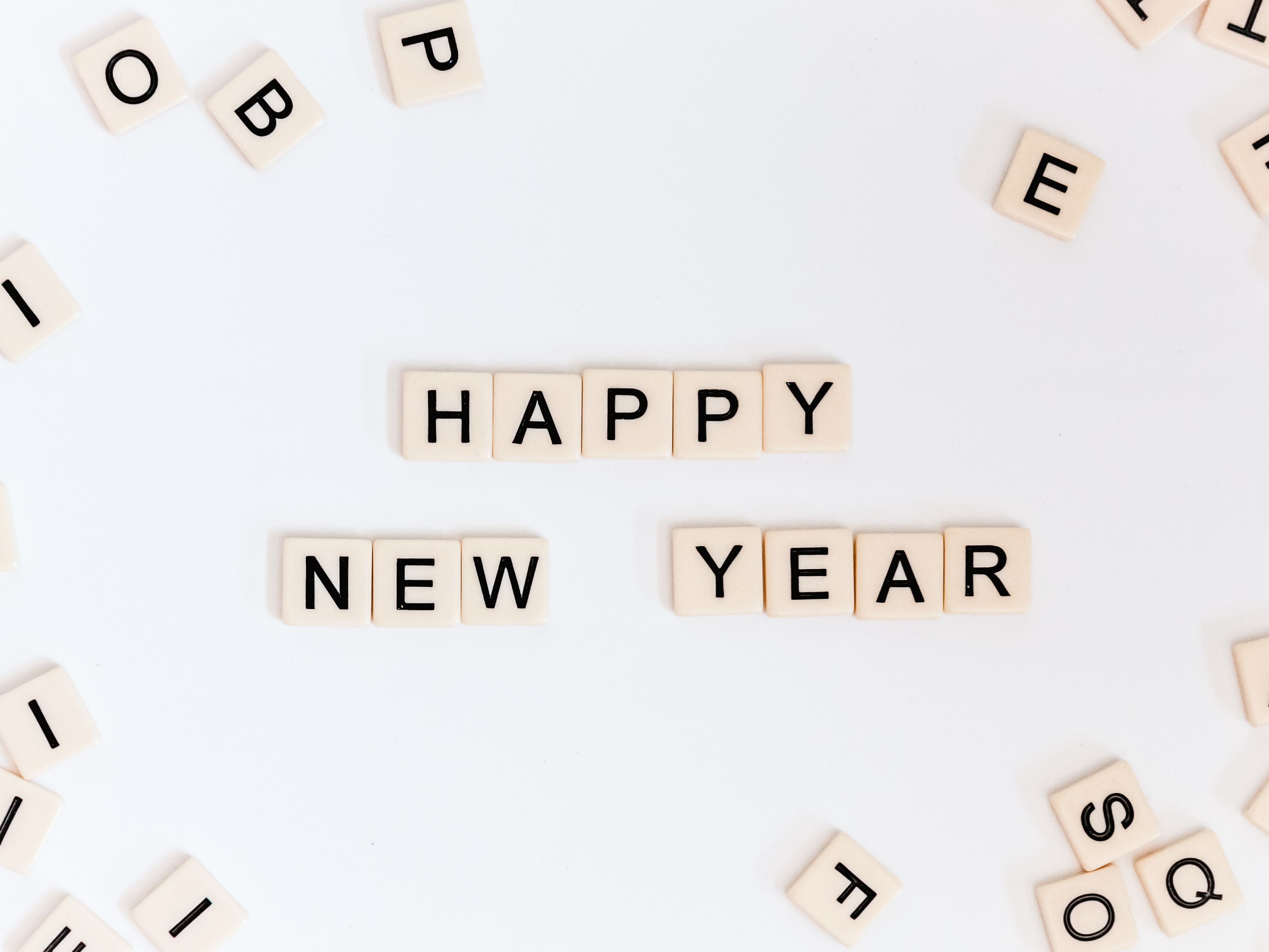 letters saying Happy New Year on white background