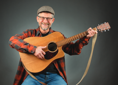 Picture of Eric Ode with guitar