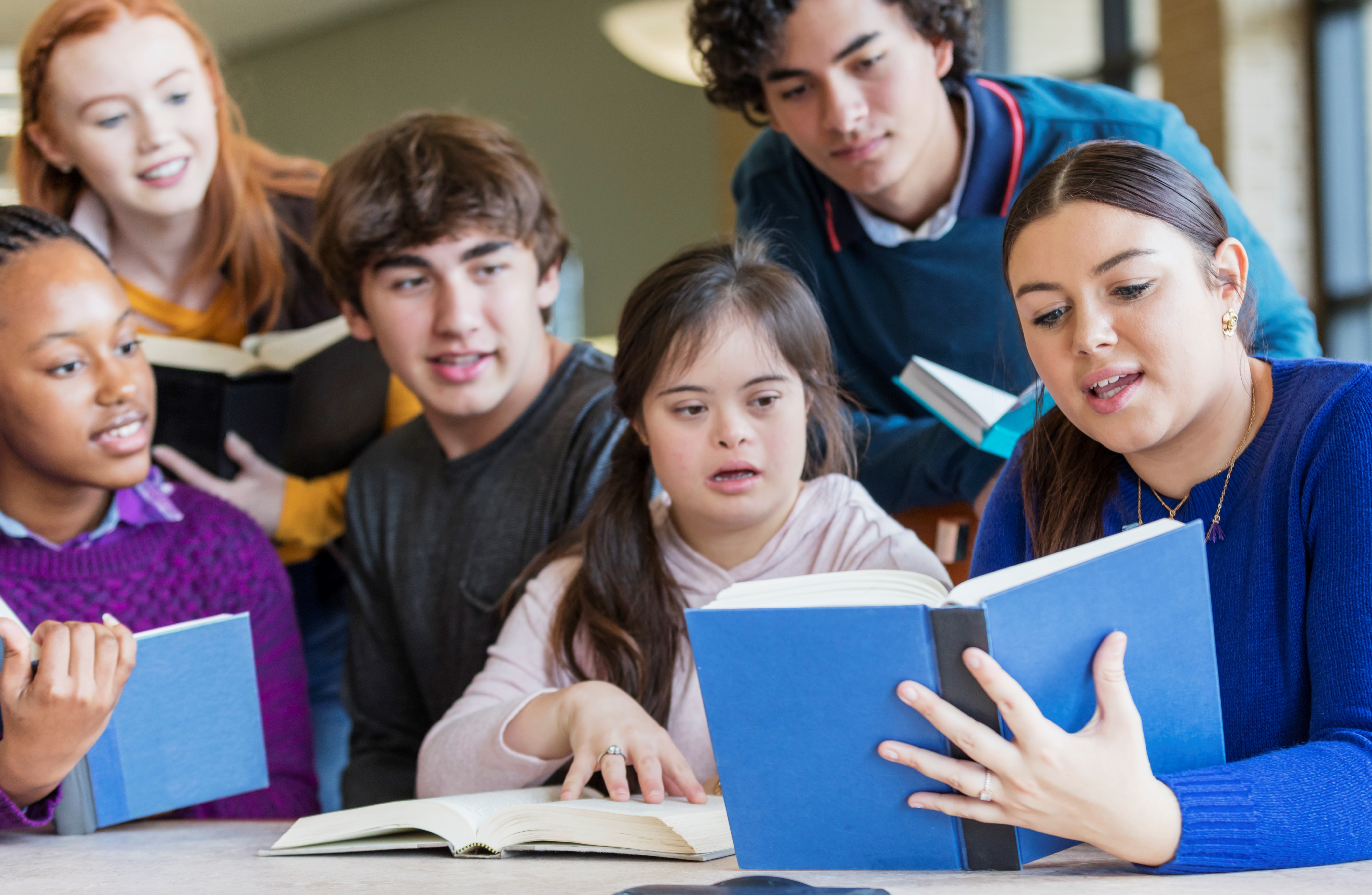 Group of Teenagers Reading