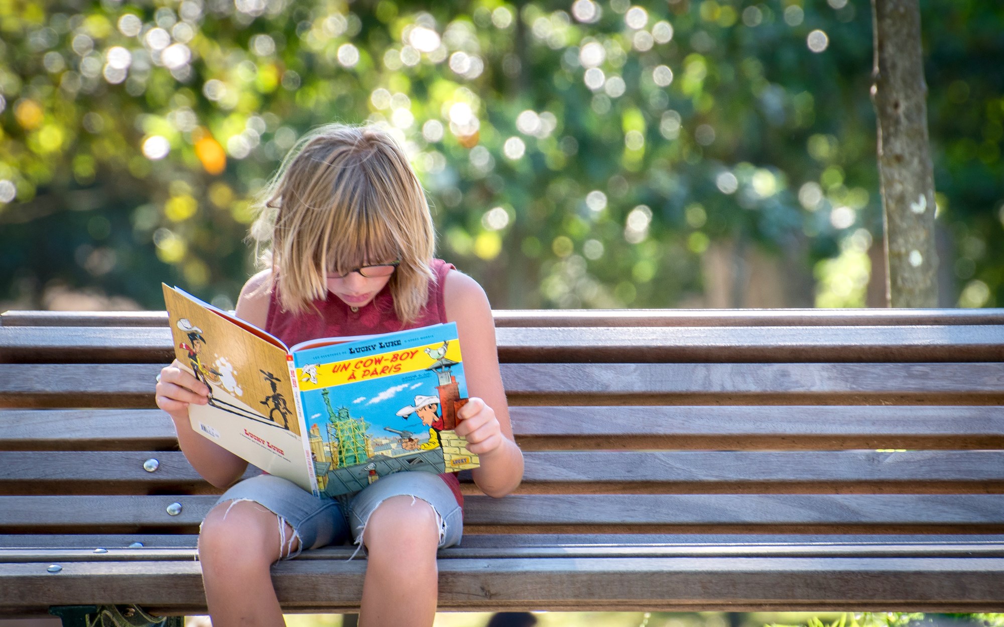 two girls in library reading two girls in library reading
