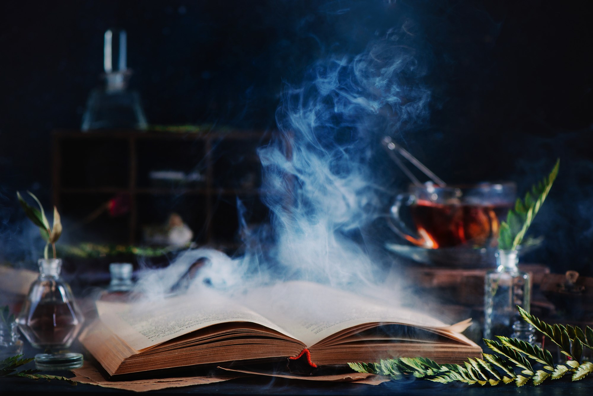 Open Book with Potions and Smoke