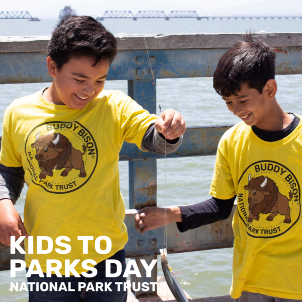 Photo of two boys with fish