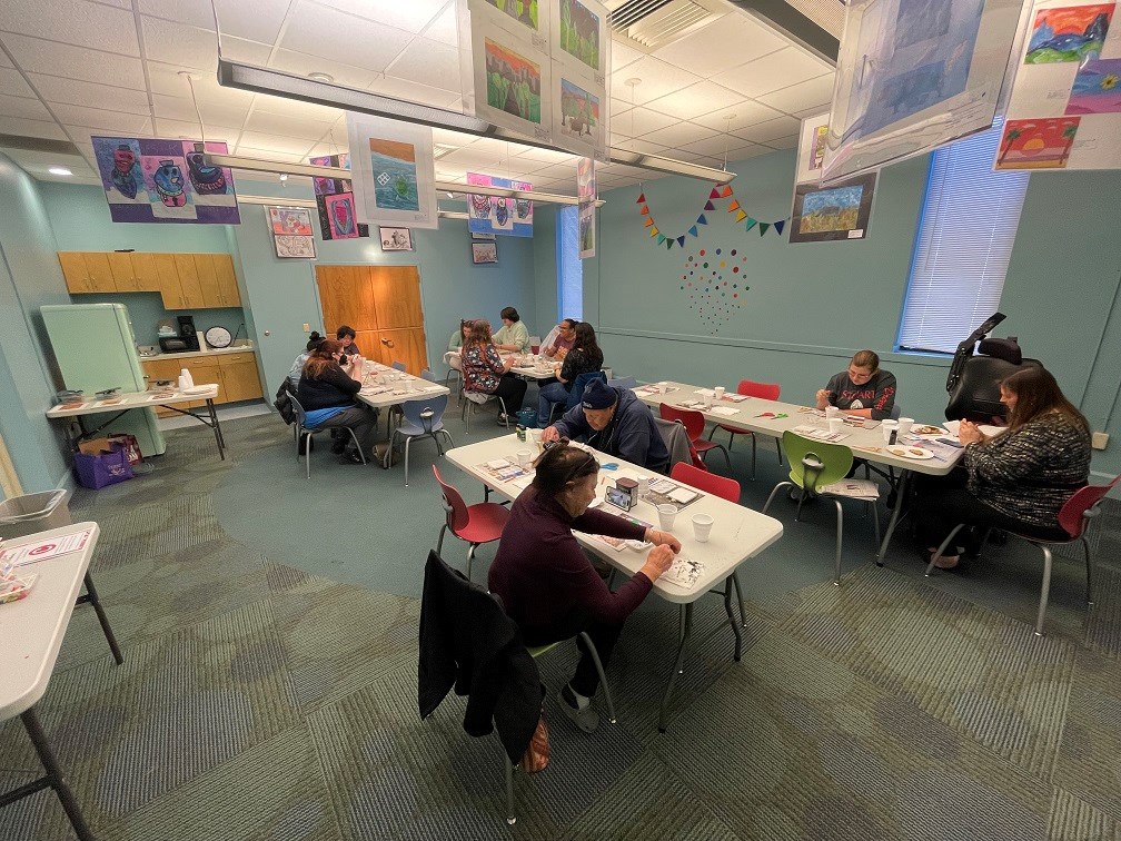 mixed book group of teens and seniors