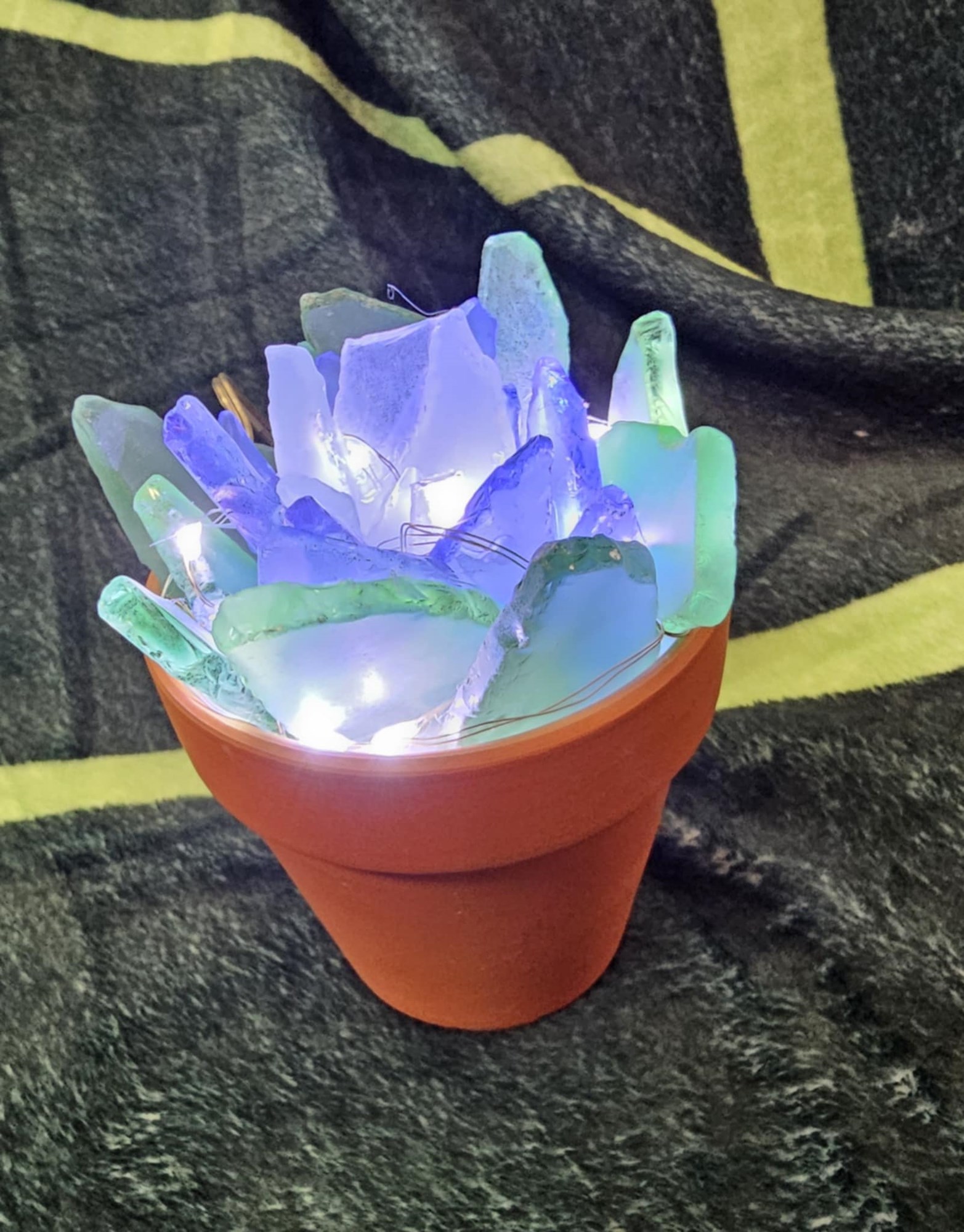 Glass plant art in ceramic planter