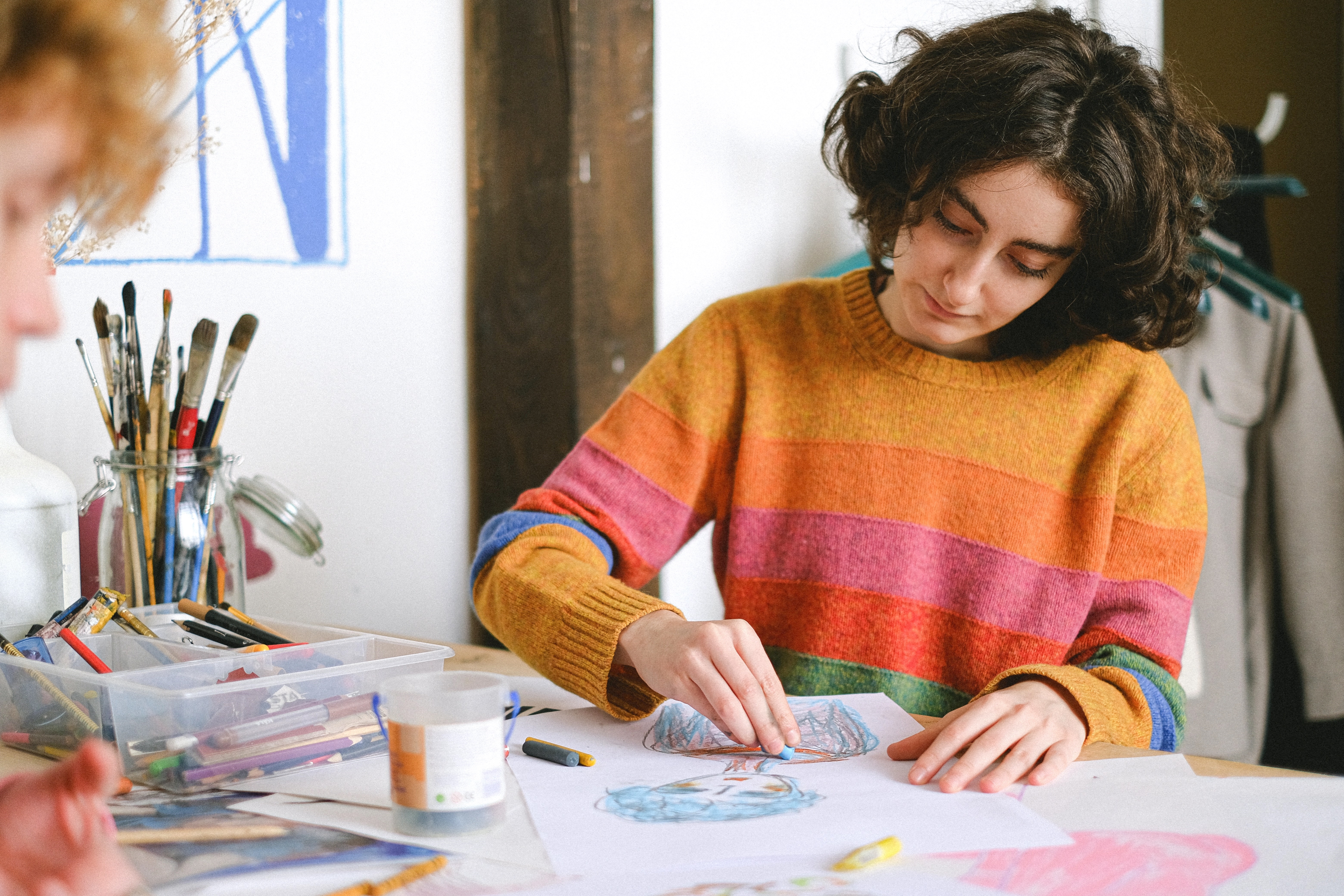 Teens Drawing in Arts & Crafts Event