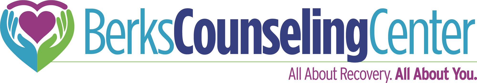 Woman Holding a Tablet Against Blank Wall