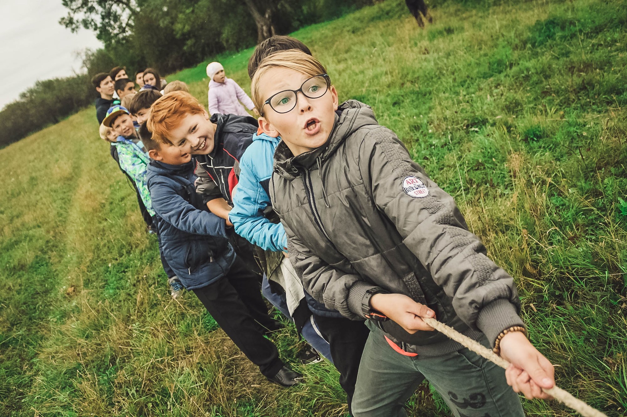 Kids Playing a Game of Tug of War with Rope 