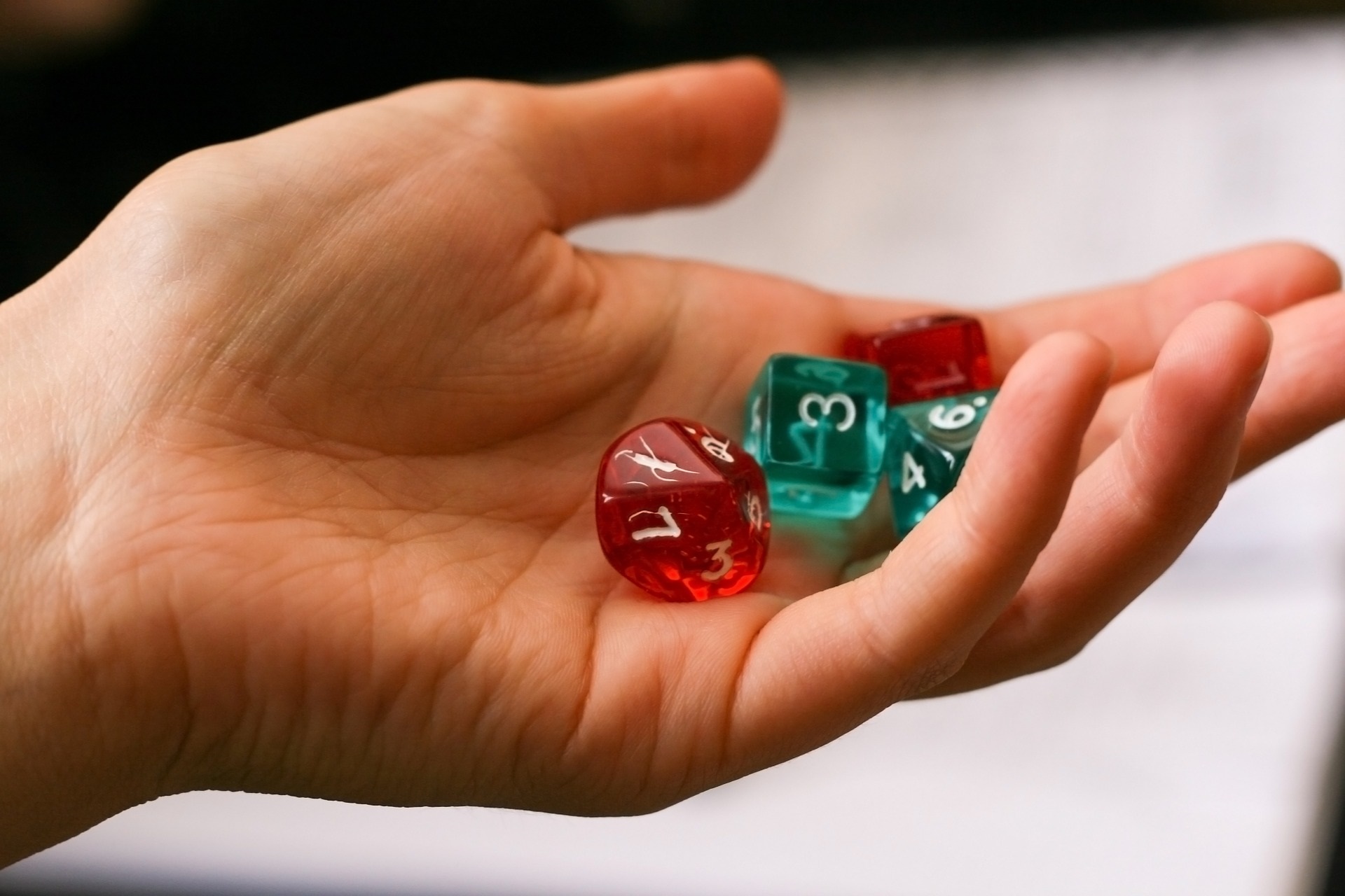 Dungeons and Dragons Dice in Hand