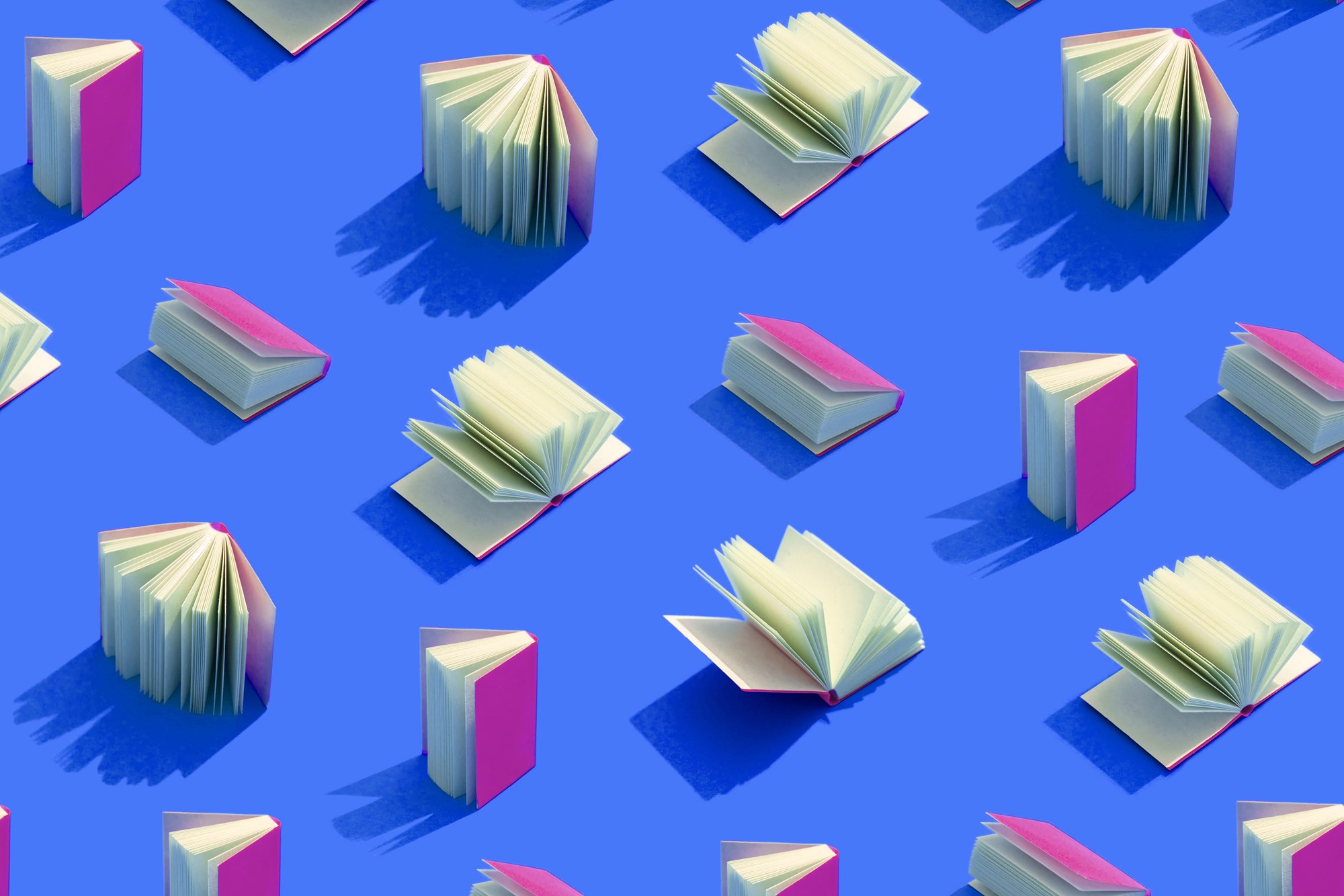 Pink Books on Blue Background