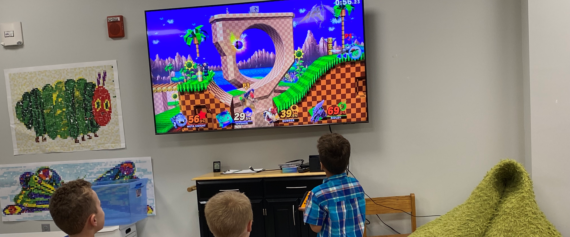 Gamers Guild meeting in the Children's Room and playing Super Smash Bros.