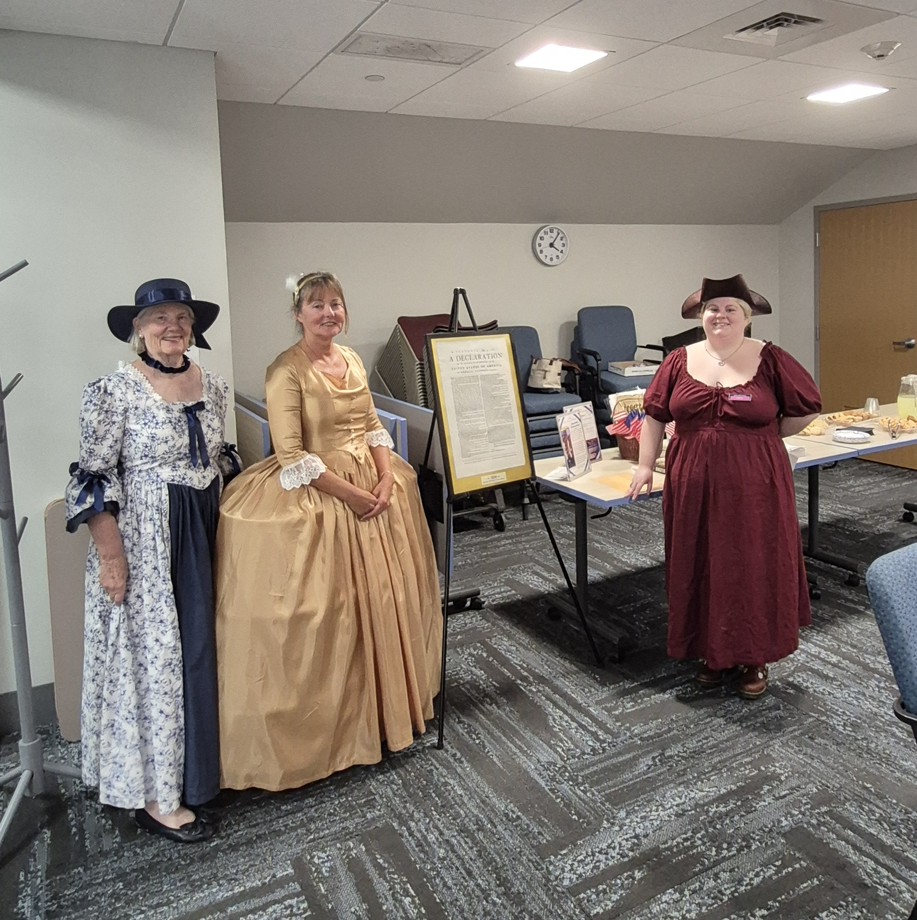Two members of DAR and a librarian at the tea party in the Meeting Room.