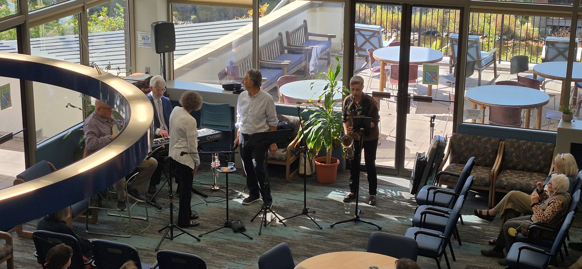 Now's the Time performing in the Main Seating area of the library.