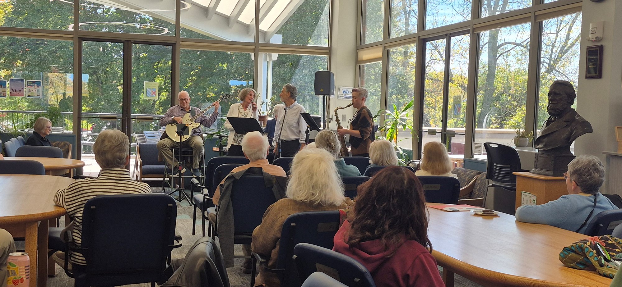 Now's the Time performing in the Main Seating area of the library.