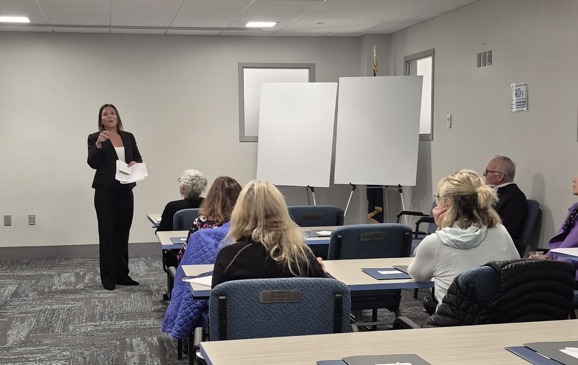 Edward Jones representatives presenting in the Meeting Room.