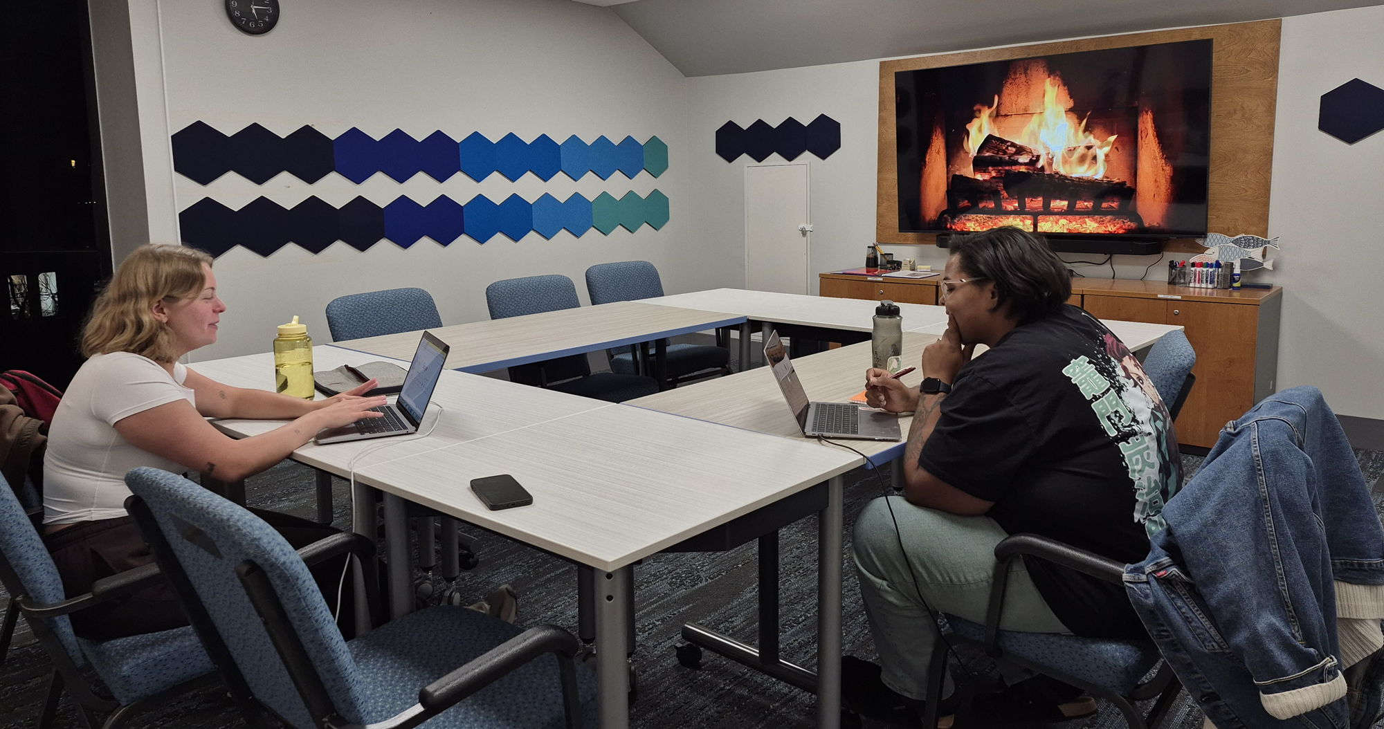 Library patrons studying in the Conference Room.