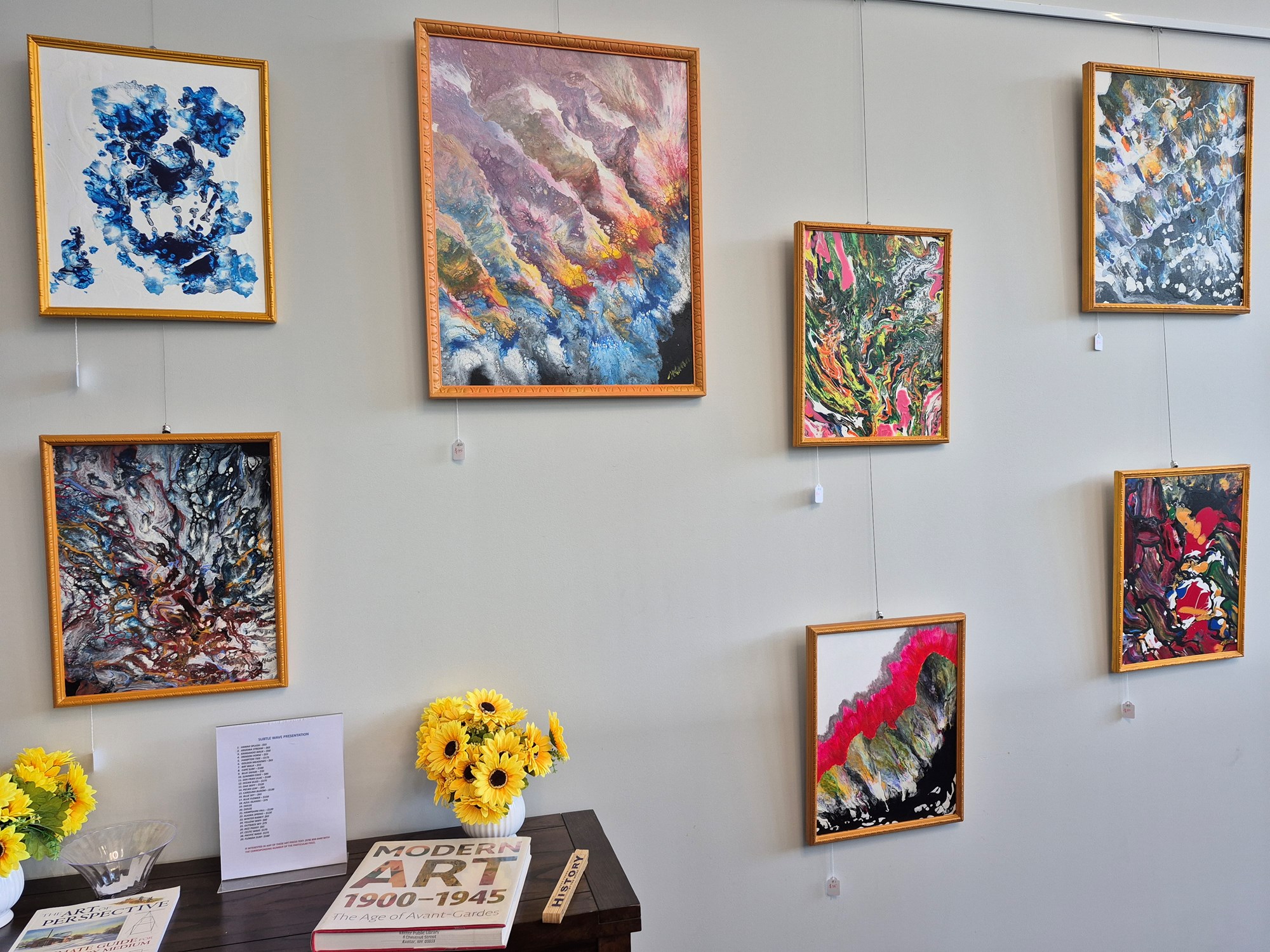 Subtle Waves exhibit by July artist Joseph Michael Kinaa on display in the Godino Mystery Wing of the library. Subtle Waves exhibit by July artist Joseph Michael Kinaa on display in the Godino Mystery Wing of the library.