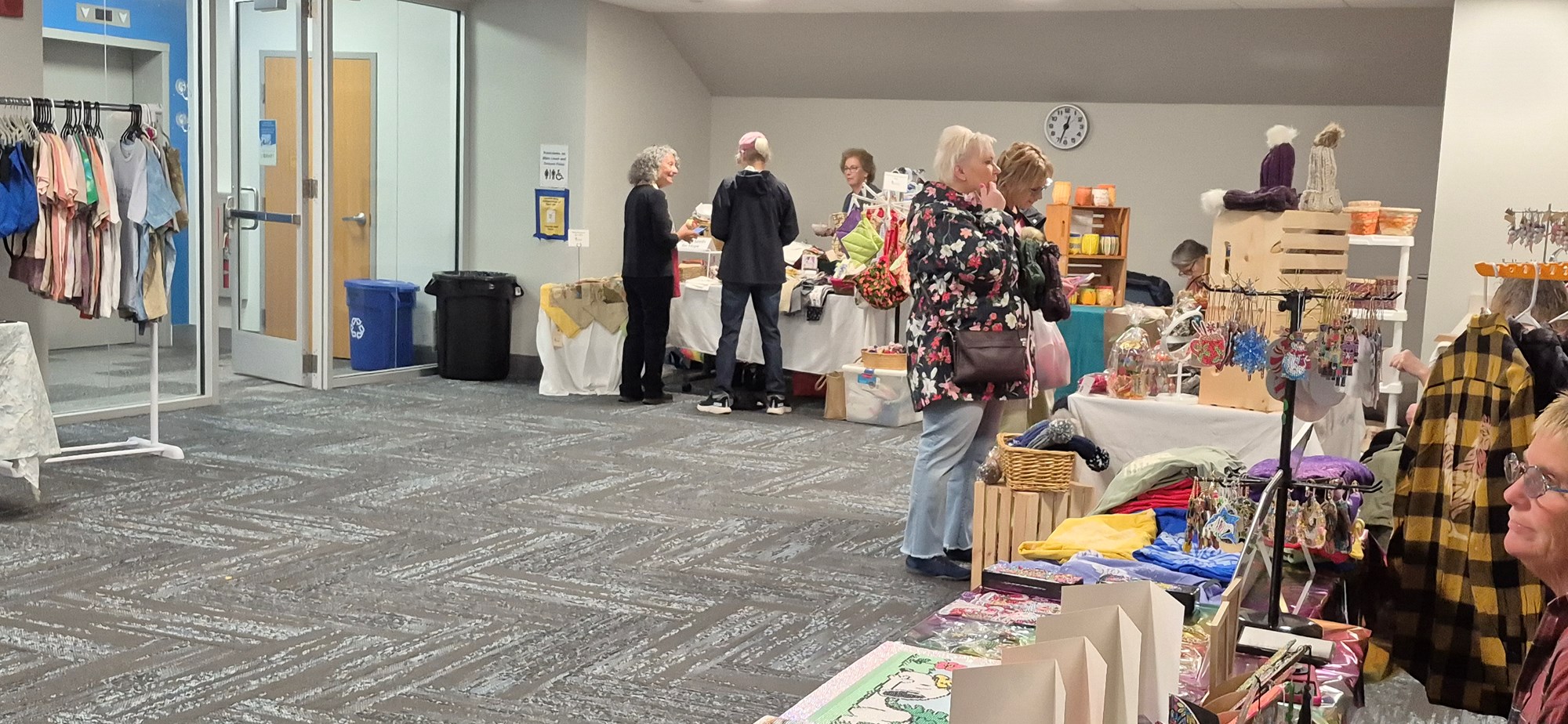 Vendors and patrons in the Meeting Room during the Fall Craft Fair.