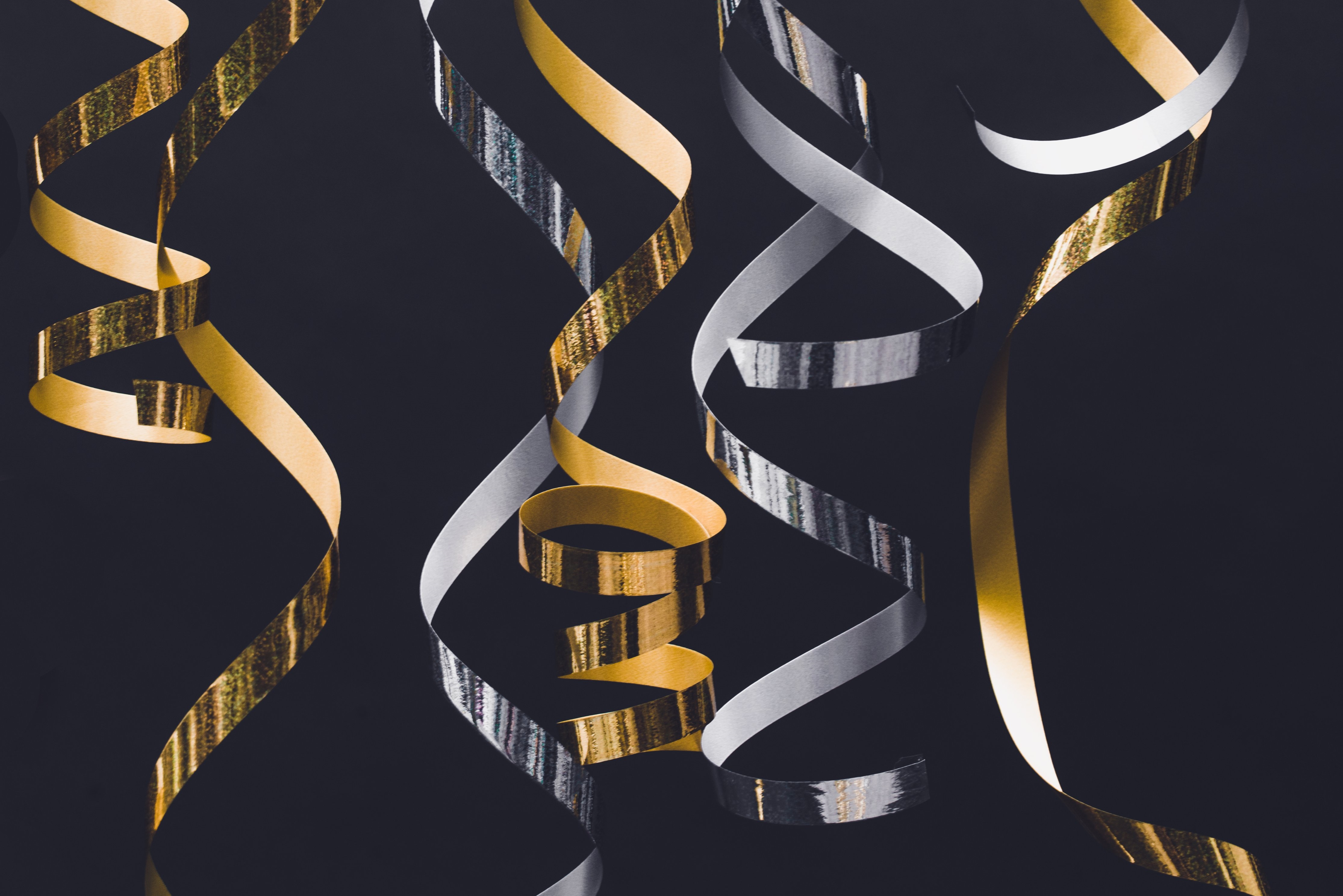 Silver and Gold Streamer on Black Background