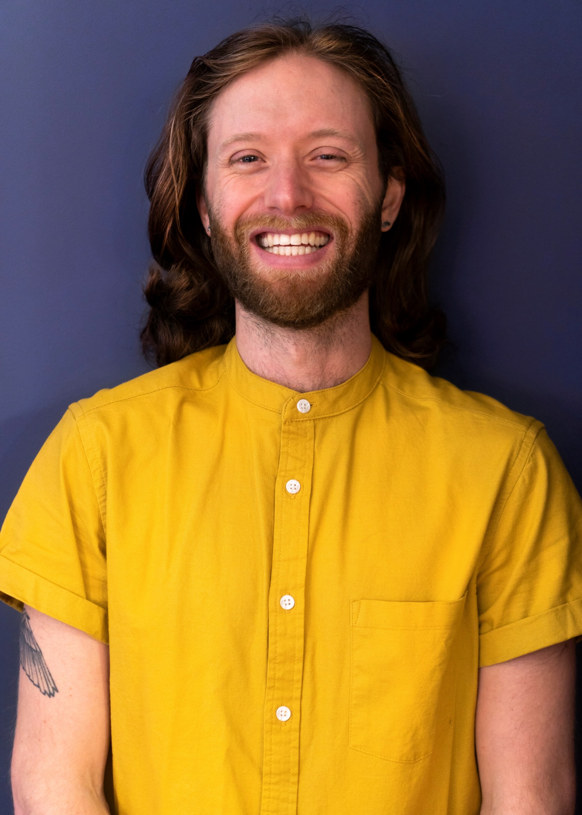 A headshot of Jake Savage, Somerville Library Social Worker.